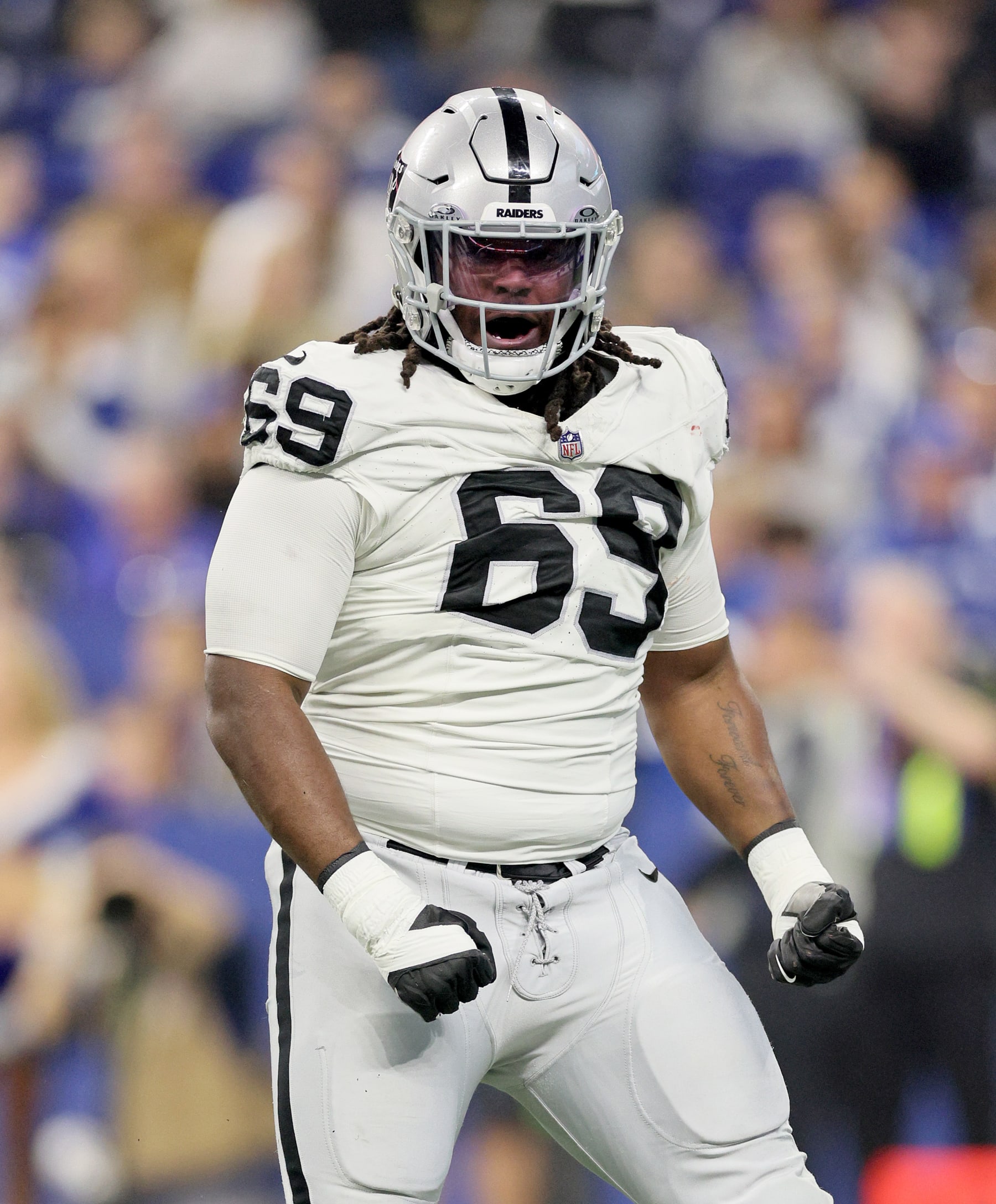 INDIANAPOLIS, INDIANA - DECEMBER 31: Adam Butler #69 of the Las Vegas Raiders celebrates in the game against the Indianapolis Colts at Lucas Oil Stadium on December 31, 2023 in Indianapolis, Indiana. (Photo by Andy Lyons/Getty Images) INDIANAPOLIS, INDIANA - DECEMBER 31: Adam Butler #69 of the Las Vegas Raiders celebrates in the game against the Indianapolis Colts at Lucas Oil Stadium on December 31, 2023 in Indianapolis, Indiana. (Photo by Andy Lyons/Getty Images)