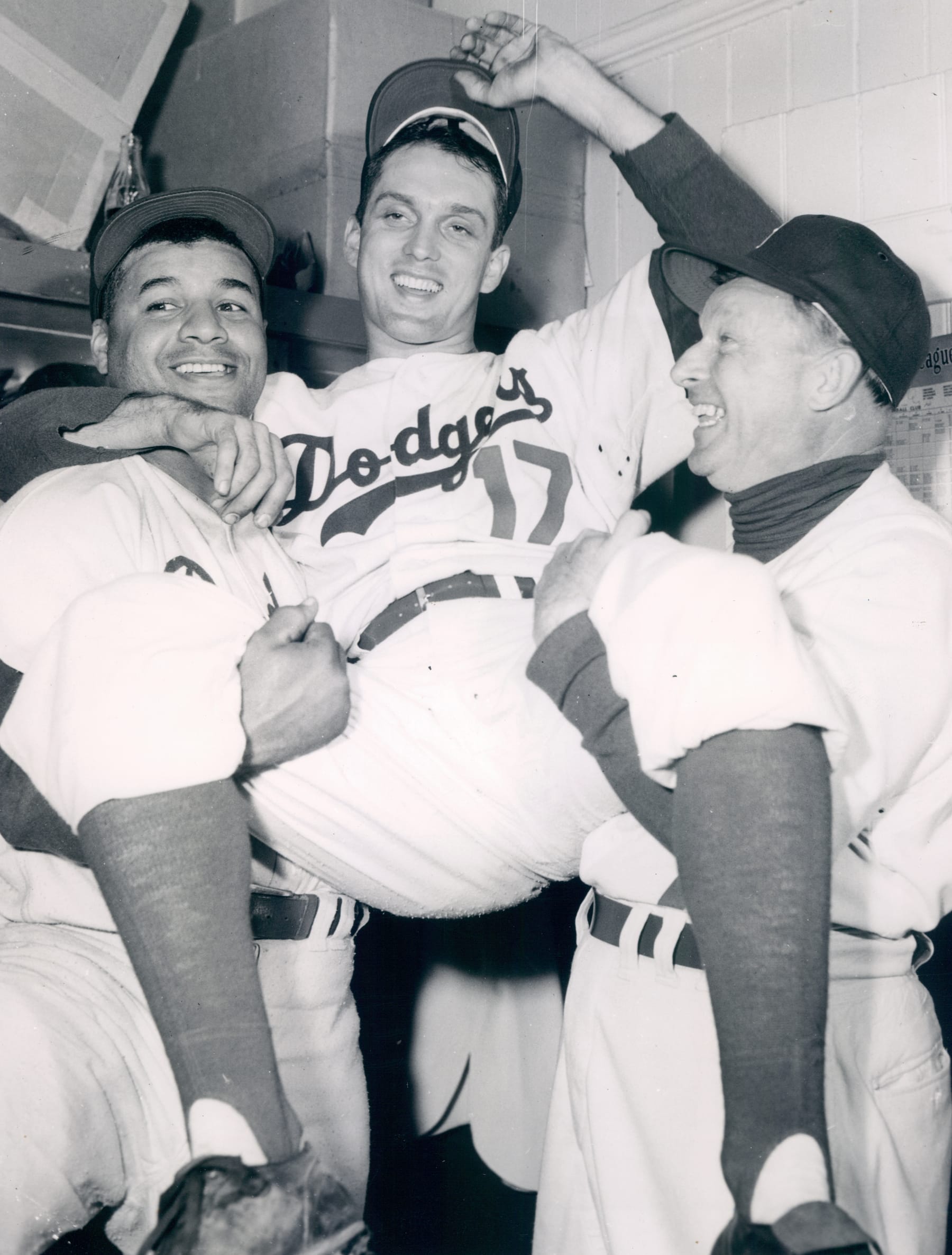 UNSPECIFIED - UNDATED:1953 World Series game 3 victors celebrate left to right Brooklyn Dodgers Ray Campanella, Carl Erskine and Brooklyn Dodgers manager Chuck Dressen. (Sports Studio Photos/Getty Images)