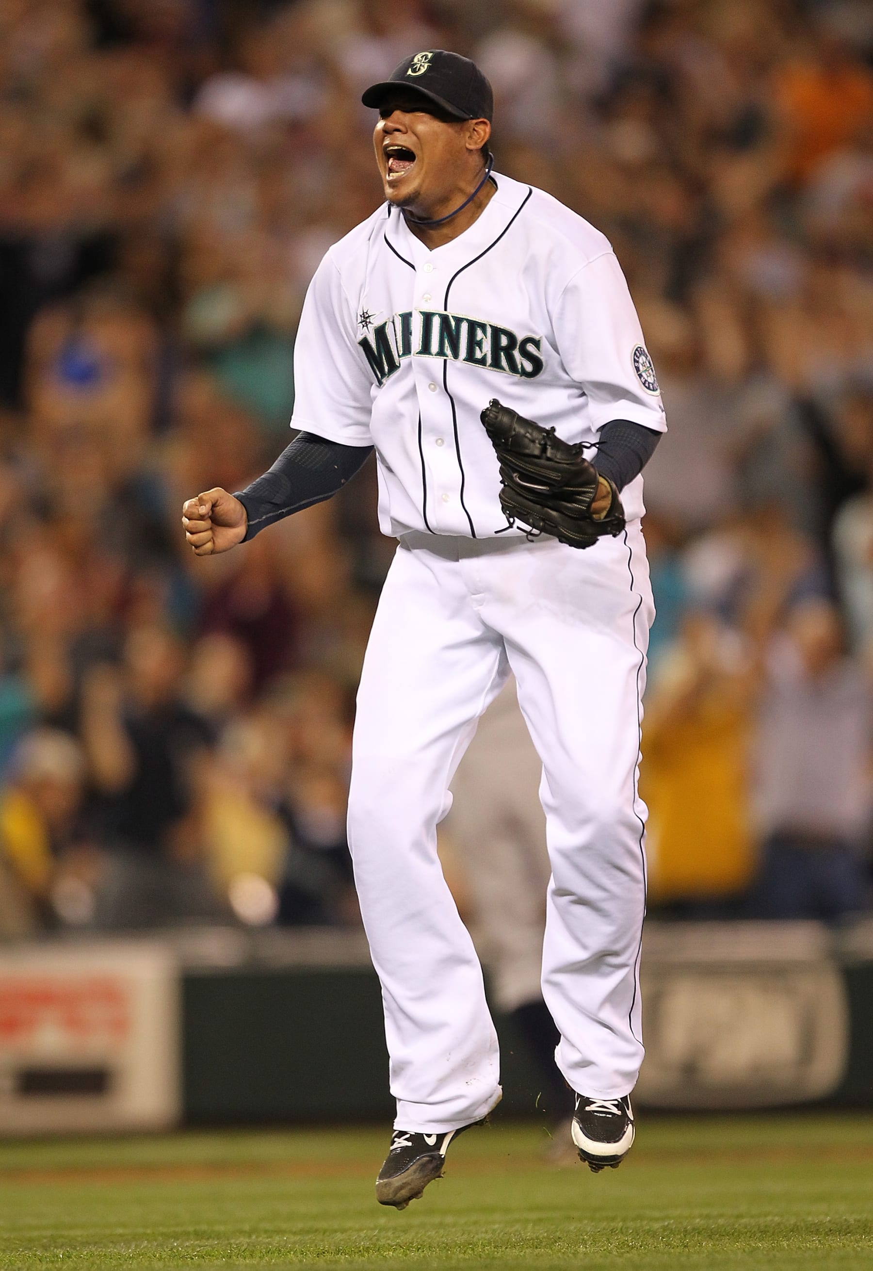 SEATTLE - JULY 10:  Starting pitcher Felix Hernandez #34 of the Seattle Mariners jumps for joy after defeating the New York Yankees 4-1 at Safeco Field on July 10, 2010 in Seattle, Washington.  (Photo by Otto Greule Jr/Getty Images)