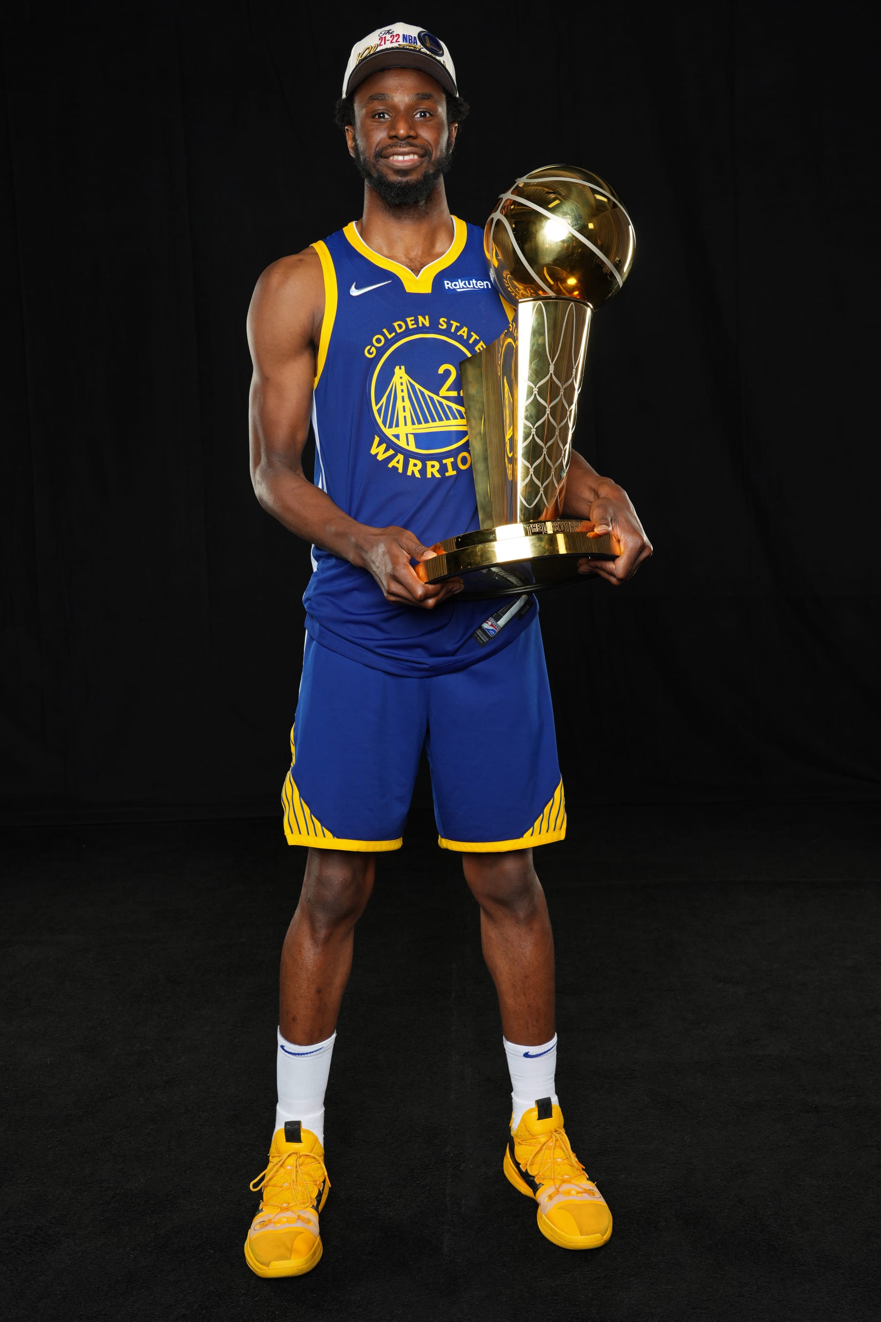 BOSTON, MA - JUNE 16: Andrew Wiggins #22 of the Golden State Warriors poses with the Larry O'Brien NBA Championship Trophy after winning game 6 of the NBA finals against the Boston Celtics on June 16, 2022 at TD Garden in Boston, Massachusetts. NOTE TO USER: User expressly acknowledges and agrees that, by downloading and or using this photograph, user is consenting to the terms and conditions of Getty Images License Agreement. Mandatory Copyright Notice: Copyright 2022 NBAE (Photo by Jesse D. Garrabrant/NBAE via Getty Images)