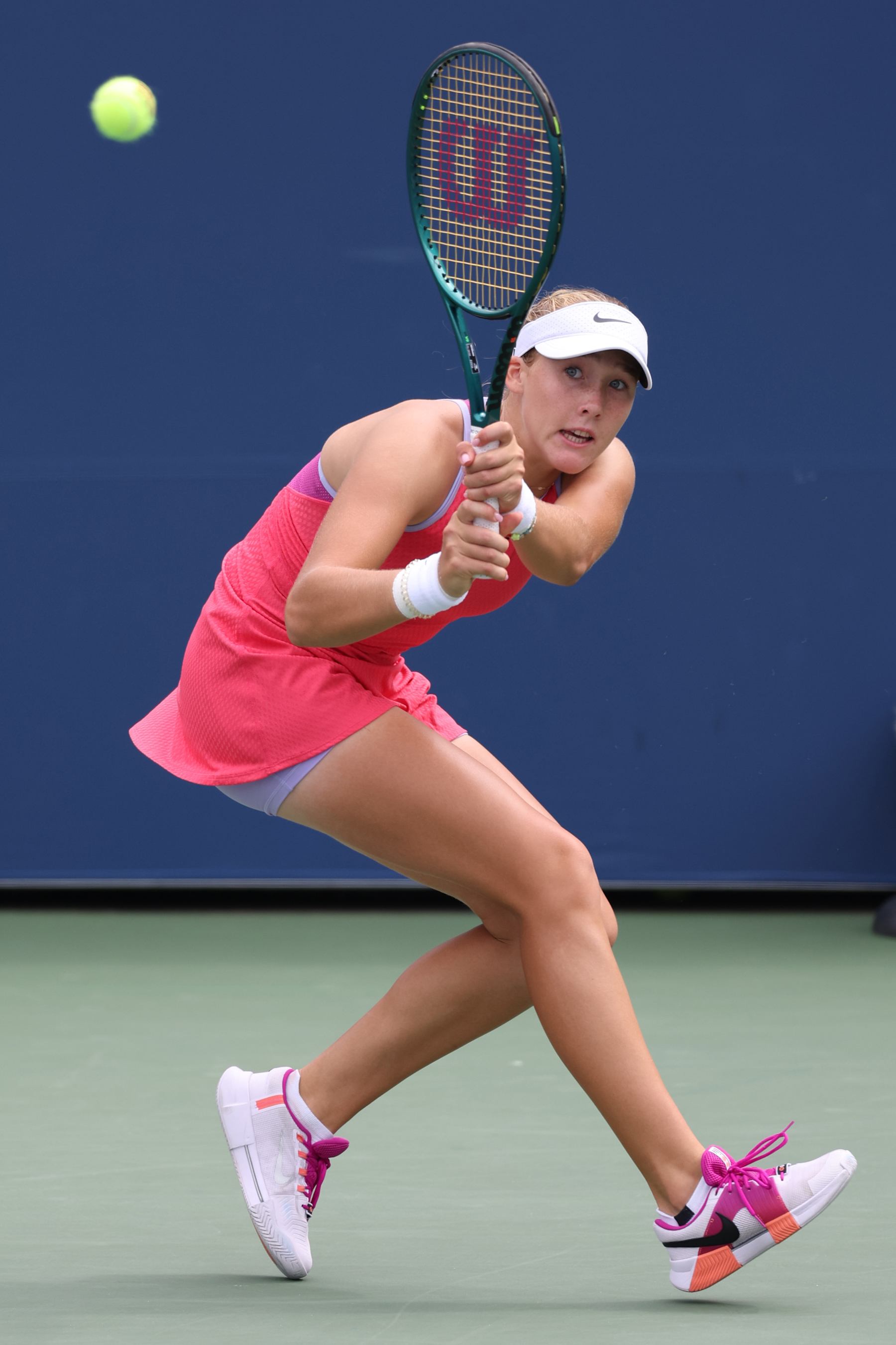 NEW YORK, NEW YORK - AUGUST 29: Mirra Andreeva of Russia returns a shot against Ashlyn Krueger of the United States during their Women's Singles Second Round match on Day Four of the 2024 US Open at USTA Billie Jean King National Tennis Center on August 29, 2024 in the Flushing neighborhood of the Queens borough of New York City. (Photo by Jamie Squire/Getty Images)