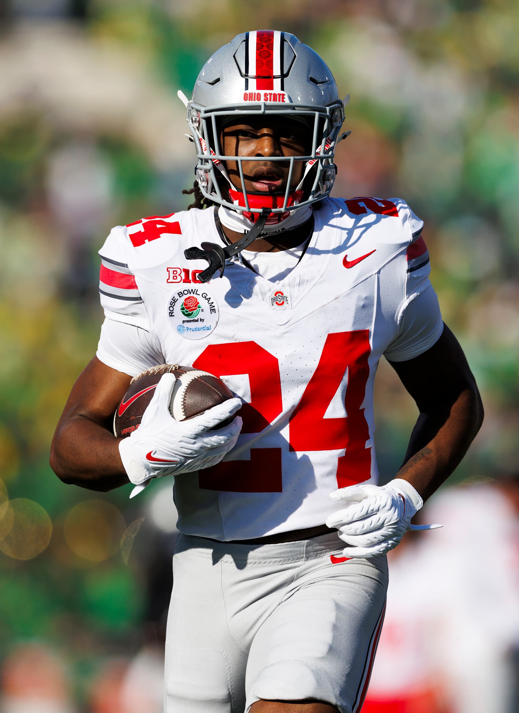 PASADENA, CALIFORNIA - JANUARY 1: Sam Williams-Dixon #24 of the Ohio State Buckeyes runs with the ball before the Rose Bowl against Oregon Ducks at Rose Bowl Stadium on January 1, 2025 in Pasadena, California. (Photo by Ric Tapia/Getty Images)