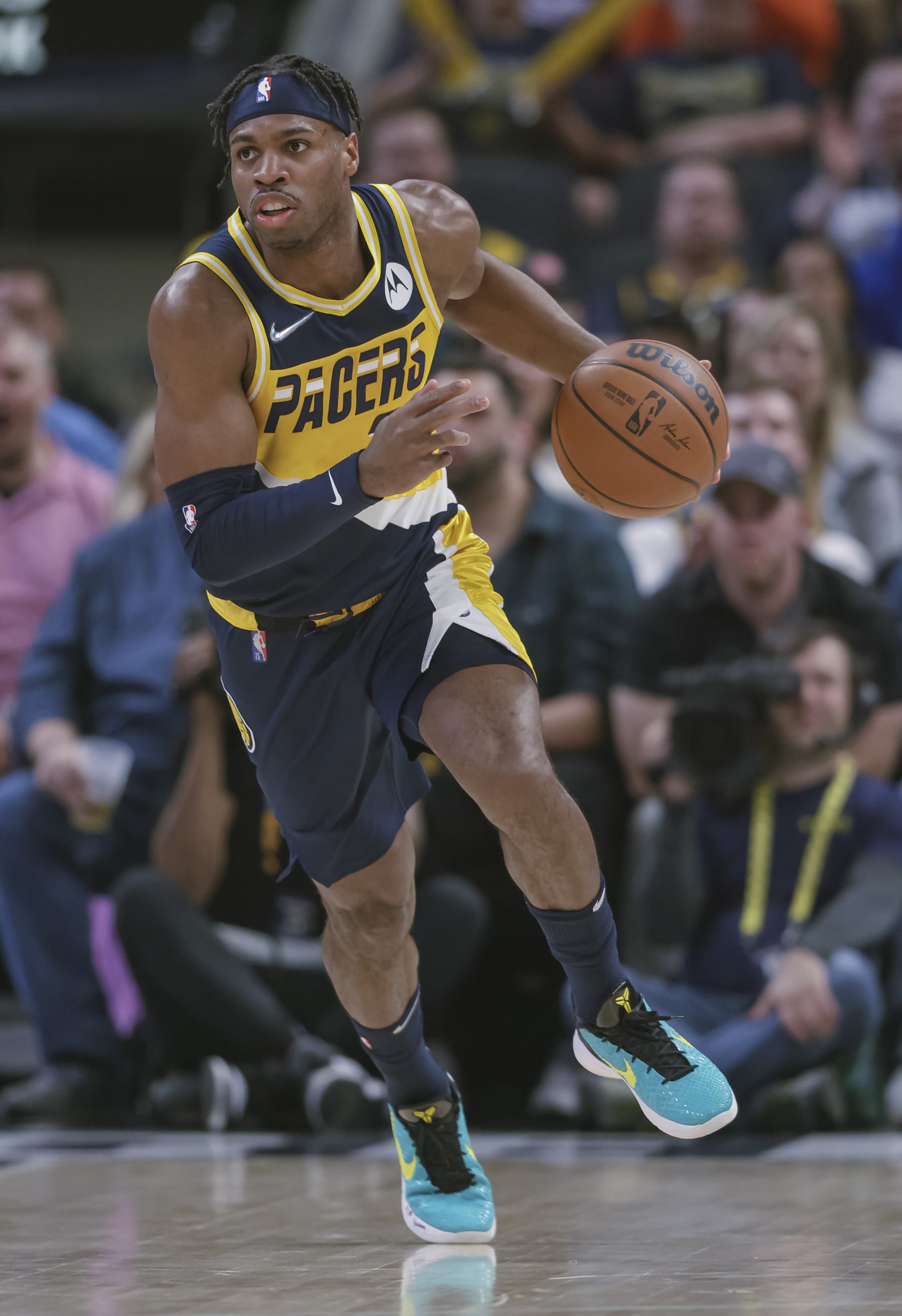 INDIANAPOLIS, IN - APRIL 03: Buddy Hield #24 of the Indiana Pacers brings the ball up court during the game against the Detroit Pistons at Gainbridge Fieldhouse on April 3, 2022 in Indianapolis, Indiana. NOTE TO USER: User expressly acknowledges and agrees that, by downloading and or using this photograph, User is consenting to the terms and conditions of the Getty Images License Agreement. (Photo by Michael Hickey/Getty Images)