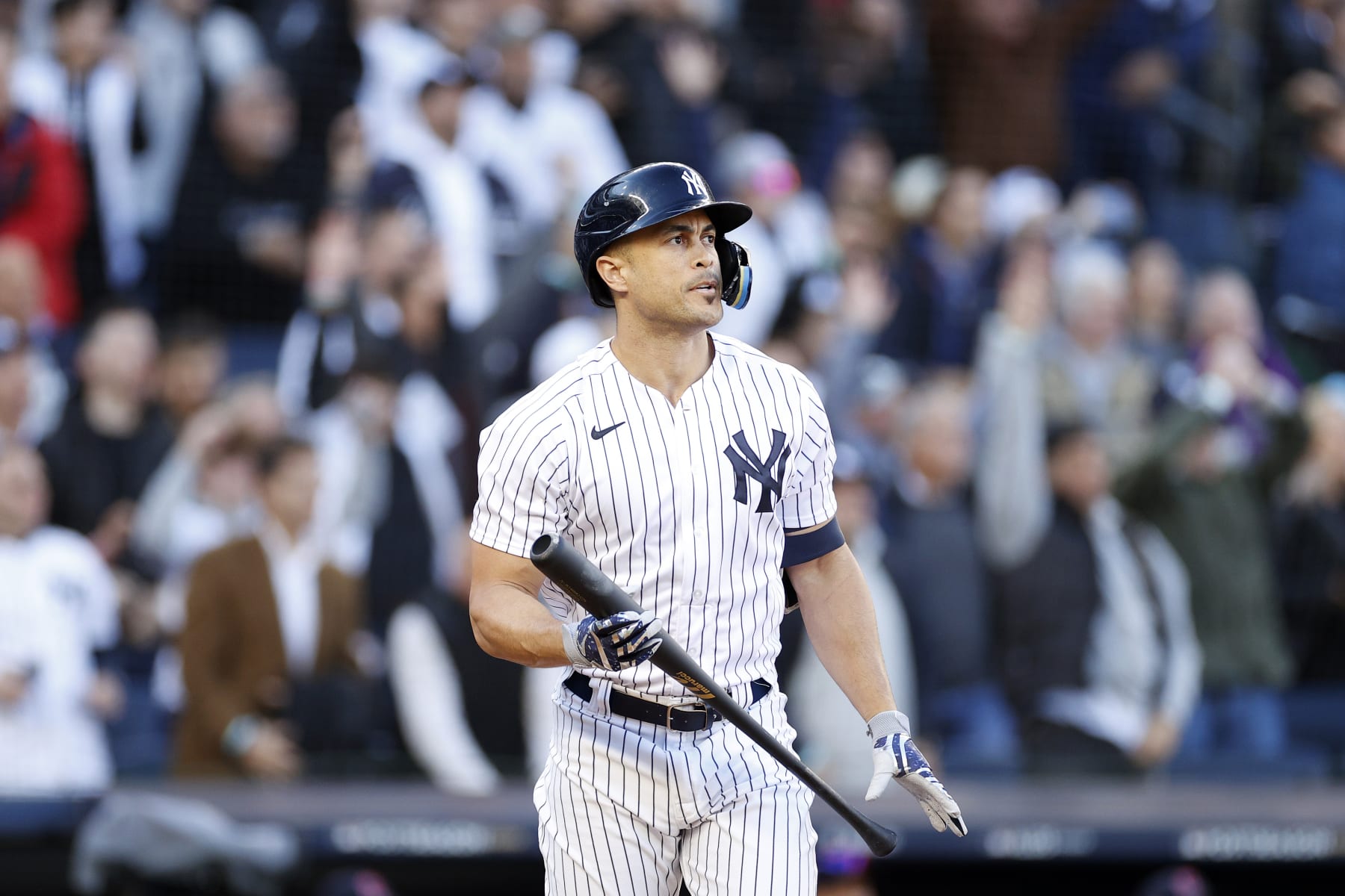 NEW YORK, NEW YORK - OCTOBER 18: Giancarlo Stanton #27 of the New York Yankees watches his three-run home run against the Cleveland Guardians during the first inning in game five of the American League Division Series at Yankee Stadium on October 18, 2022 in New York, New York. (Photo by Sarah Stier/Getty Images)