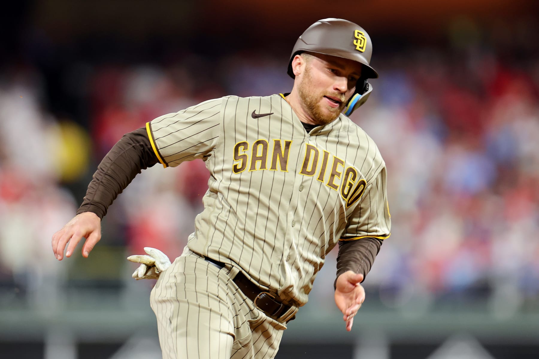 PHILADELPHIA, PENNSYLVANIA - OCTOBER 22: Brandon Drury #17 of the San Diego Padres scores a run during the first inning against the Philadelphia Phillies in game four of the National League Championship Series at Citizens Bank Park on October 22, 2022 in Philadelphia, Pennsylvania. (Photo by Michael Reaves/Getty Images) PHILADELPHIA, PENNSYLVANIA - OCTOBER 22: Brandon Drury #17 of the San Diego Padres scores a run during the first inning against the Philadelphia Phillies in game four of the National League Championship Series at Citizens Bank Park on October 22, 2022 in Philadelphia, Pennsylvania. (Photo by Michael Reaves/Getty Images)
