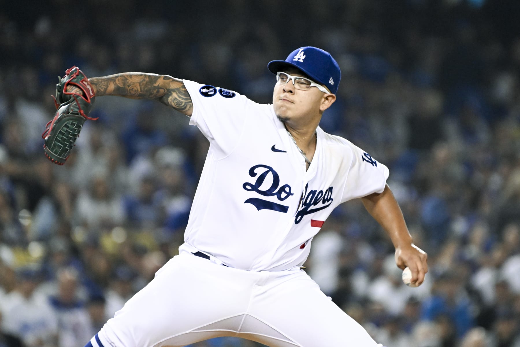 Los Angeles, CA - October 11: Los Angeles Dodgers starting pitcher Julio Urias (7) delivers a pitch during the first inning of game one of the NLDS against the San Diego Padres at Dodger Stadium on Tuesday, Oct. 11, 2022 in Los Angeles, CA.(Wally Skalij / Los Angeles Times via Getty Images)