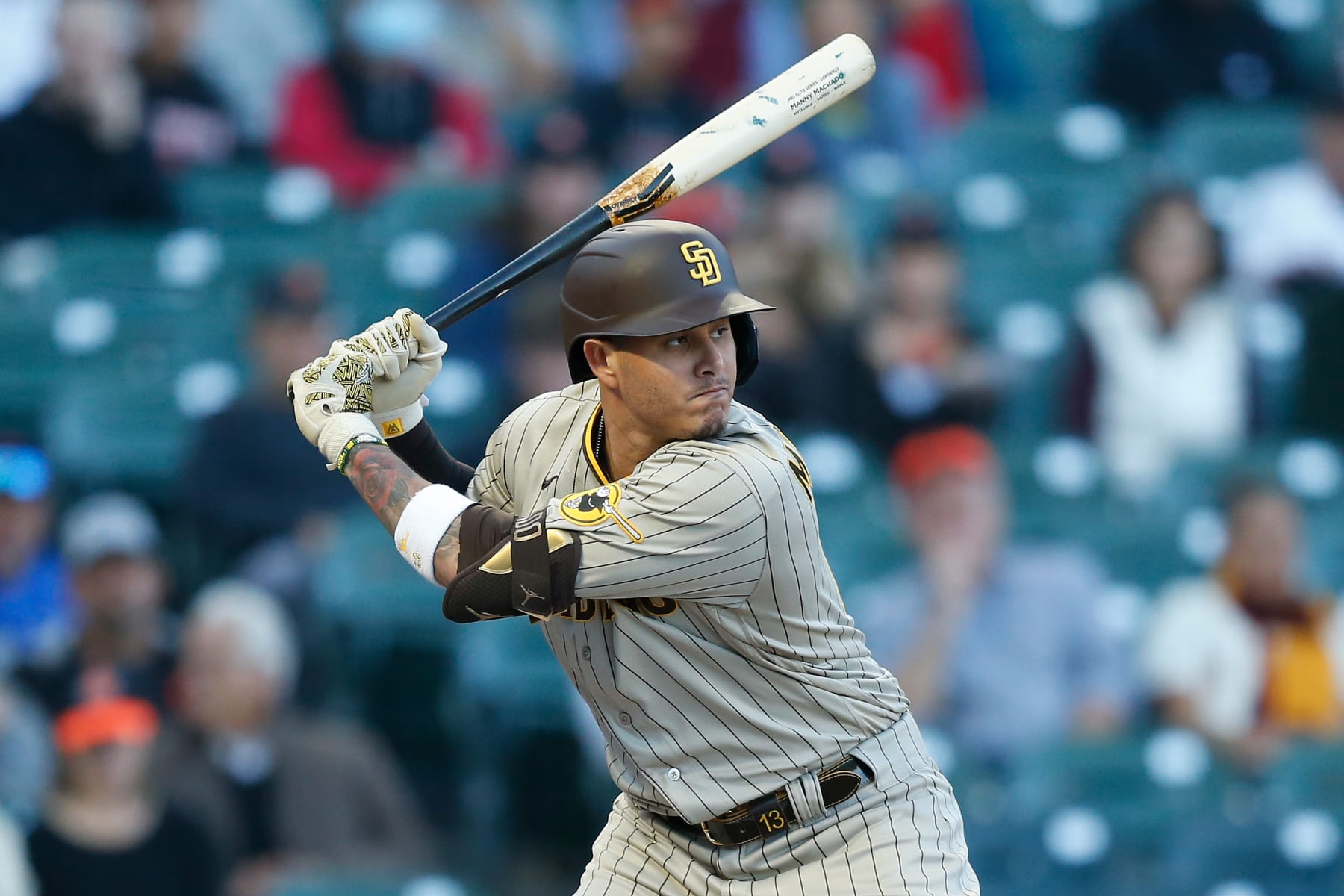 SAN FRANCISCO, CALIFORNIA - AUGUST 30: Manny Machado #13 of the San Diego Padres at bat against the San Francisco Giants at Oracle Park on August 30, 2022 in San Francisco, California. (Photo by Lachlan Cunningham/Getty Images)