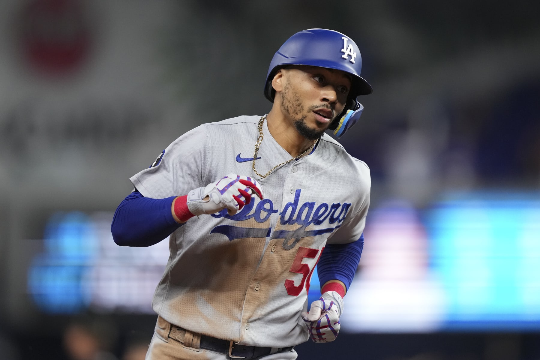 MIAMI, FLORIDA - AUGUST 26: Mookie Betts #50 of the Los Angeles Dodgers rounds third base after hitting a home run in the seventh inning against the Miami Marlins at loanDepot park on August 26, 2022 in Miami, Florida. (Photo by Eric Espada/Getty Images)