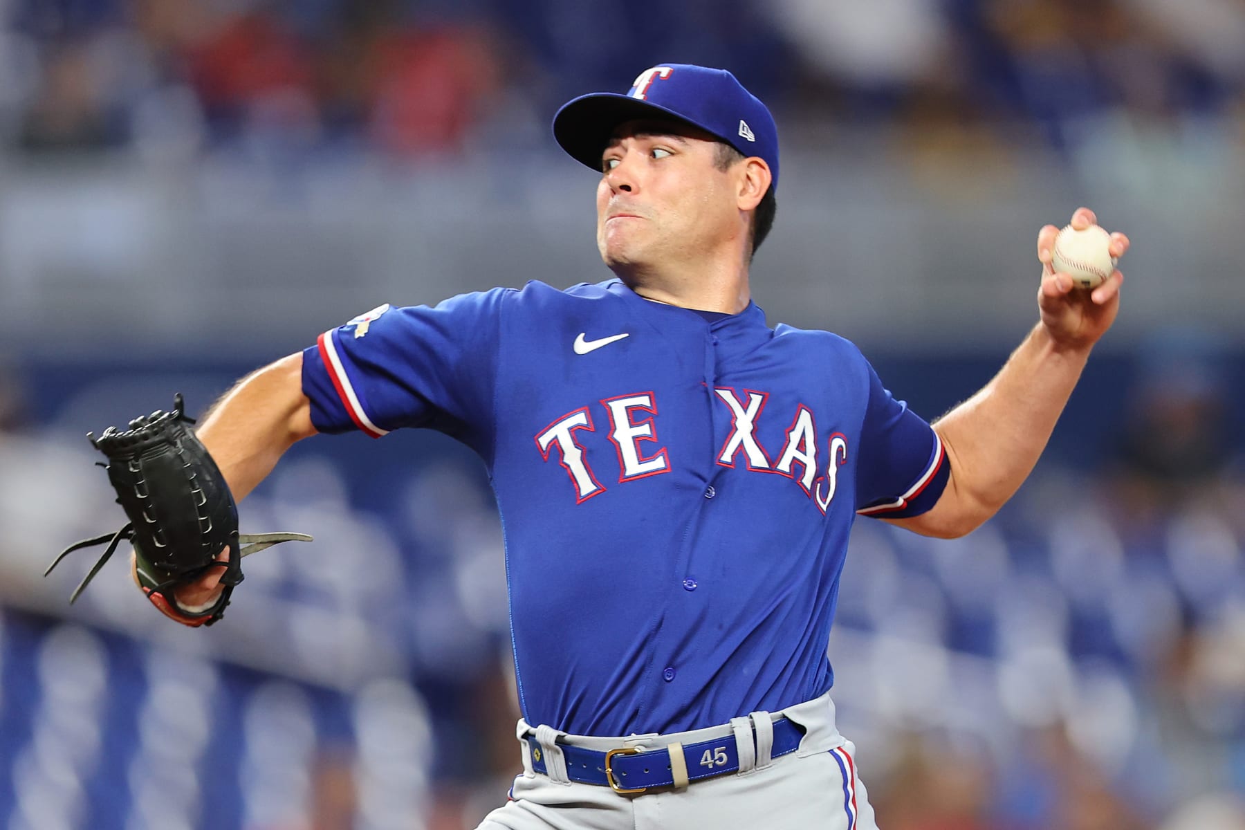 MIAMI, FLORIDA - JULY 21: Matt Moore #45 of the Texas Rangers delivers a pitch during the seventh inning against the Miami Marlins at loanDepot park on July 21, 2022 in Miami, Florida. (Photo by Michael Reaves/Getty Images)
