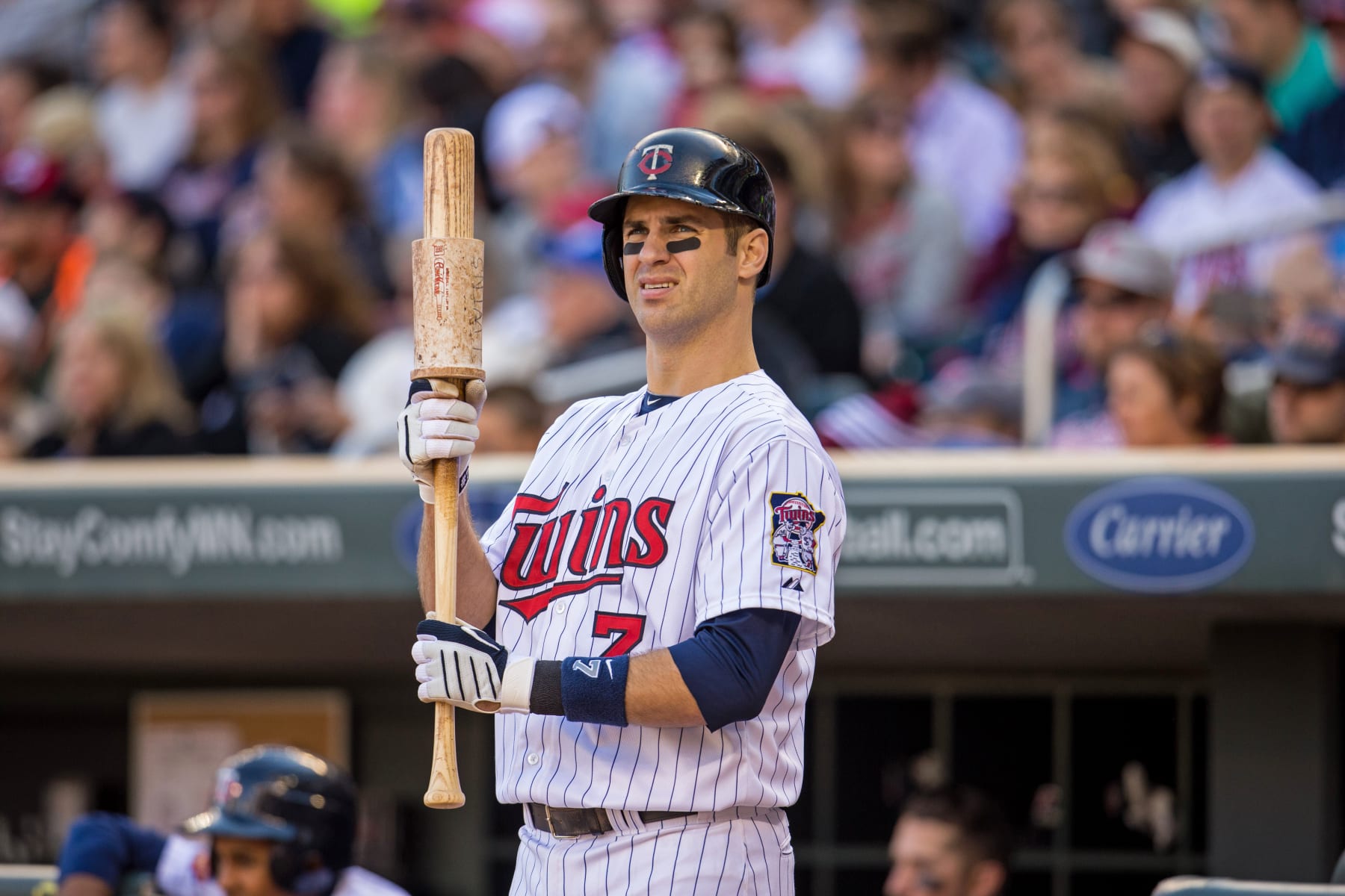 MINNEAPOLIS, MN - SEPTEMBER 21: Joe Mauer #7 of the Minnesota Twins looks on against the Cleveland Indians on September 21, 2014 at Target Field in Minneapolis, Minnesota. The Indians defeated the Twins 7-2. (Photo by Brace Hemmelgarn/Minnesota Twins/Getty Images)