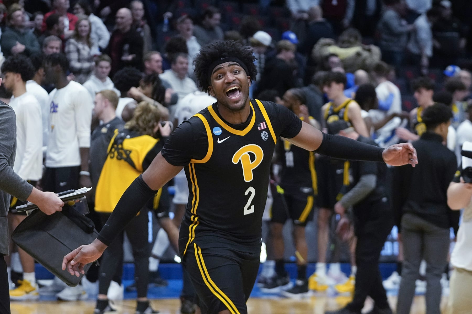 Pittsburgh's Blake Hinson (2) celebrates after Pittsburgh defeated Mississippi State in a First Four game in the NCAA men's college basketball tournament Tuesday, March 14, 2023, in Dayton, Ohio. (AP Photo/Darron Cummings)