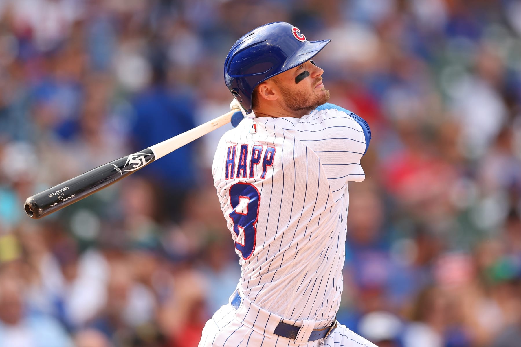 CHICAGO, ILLINOIS - AUGUST 25: Ian Happ #8 of the Chicago Cubs hits a RBI double against the St. Louis Cardinals during the eighth inning at Wrigley Field on August 25, 2022 in Chicago, Illinois. (Photo by Michael Reaves/Getty Images)