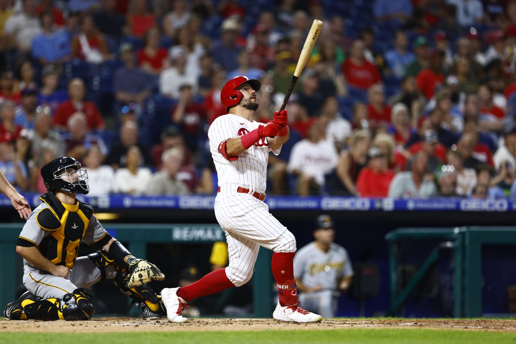 PHILADELPHIA, PA - AUGUST 26: Kyle Schwarber #12 of the Philadelphia Phillies hits a double against the Pittsburgh Pirates during a game at Citizens Bank Park on August 26, 2022 in Philadelphia, Pennsylvania. (Photo by Rich Schultz/Getty Images)