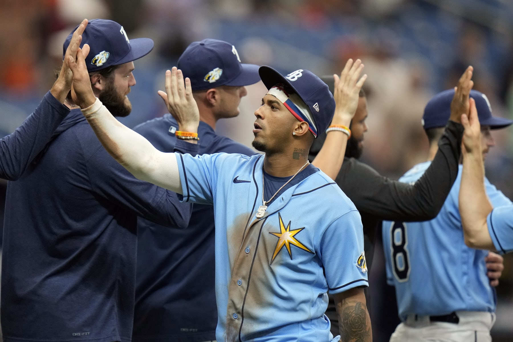 Tampa Bay Rays' Wander Franco celebrates with teammates after defeating the Detroit Tigers during a baseball game Sunday, April 2, 2023, in St. Petersburg, Fla. (AP Photo/Chris O'Meara)
