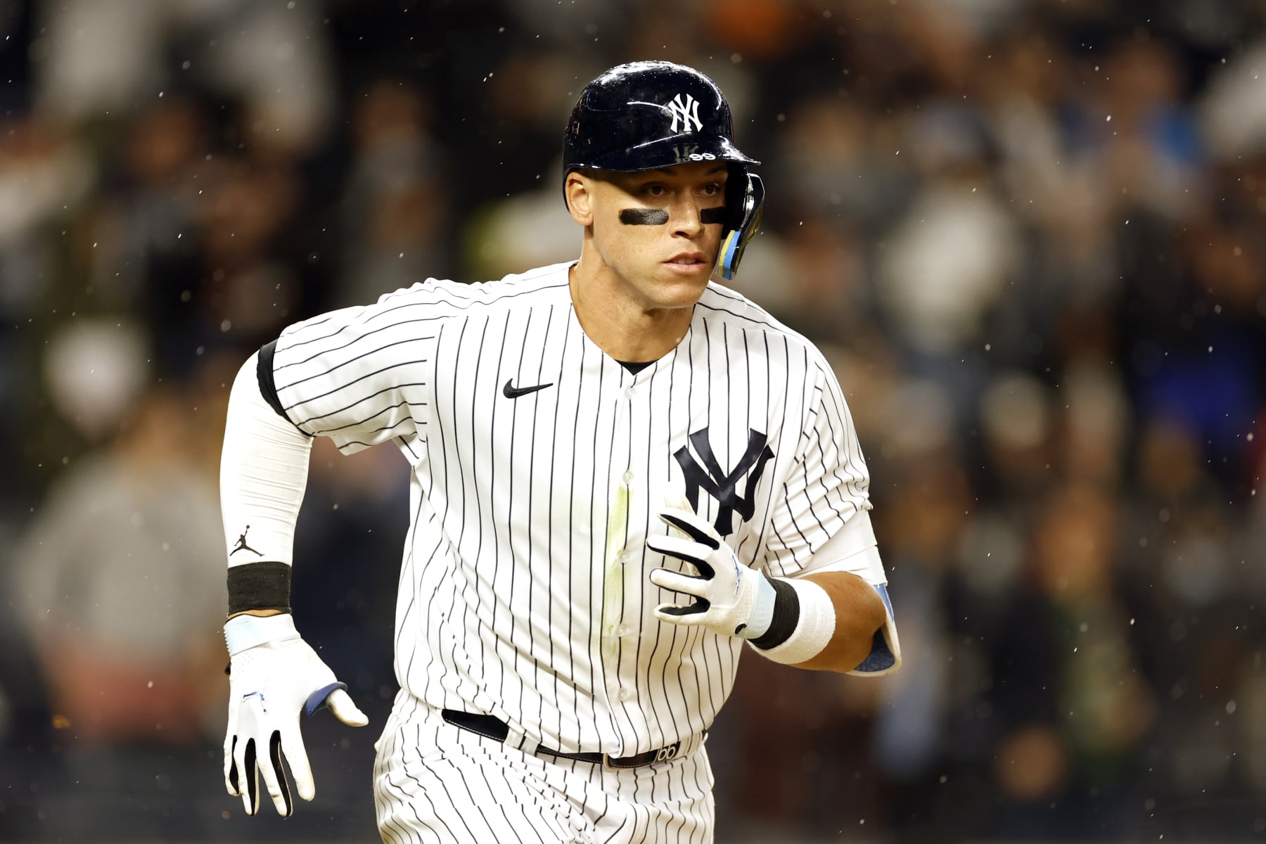 NEW YORK, NEW YORK - APRIL 01: Aaron Judge #99 of the New York Yankees runs to first during the ninth inning against the San Francisco Giants at Yankee Stadium on April 01, 2023 in the Bronx borough of New York City. The Giants won 7-5. (Photo by Sarah Stier/Getty Images)