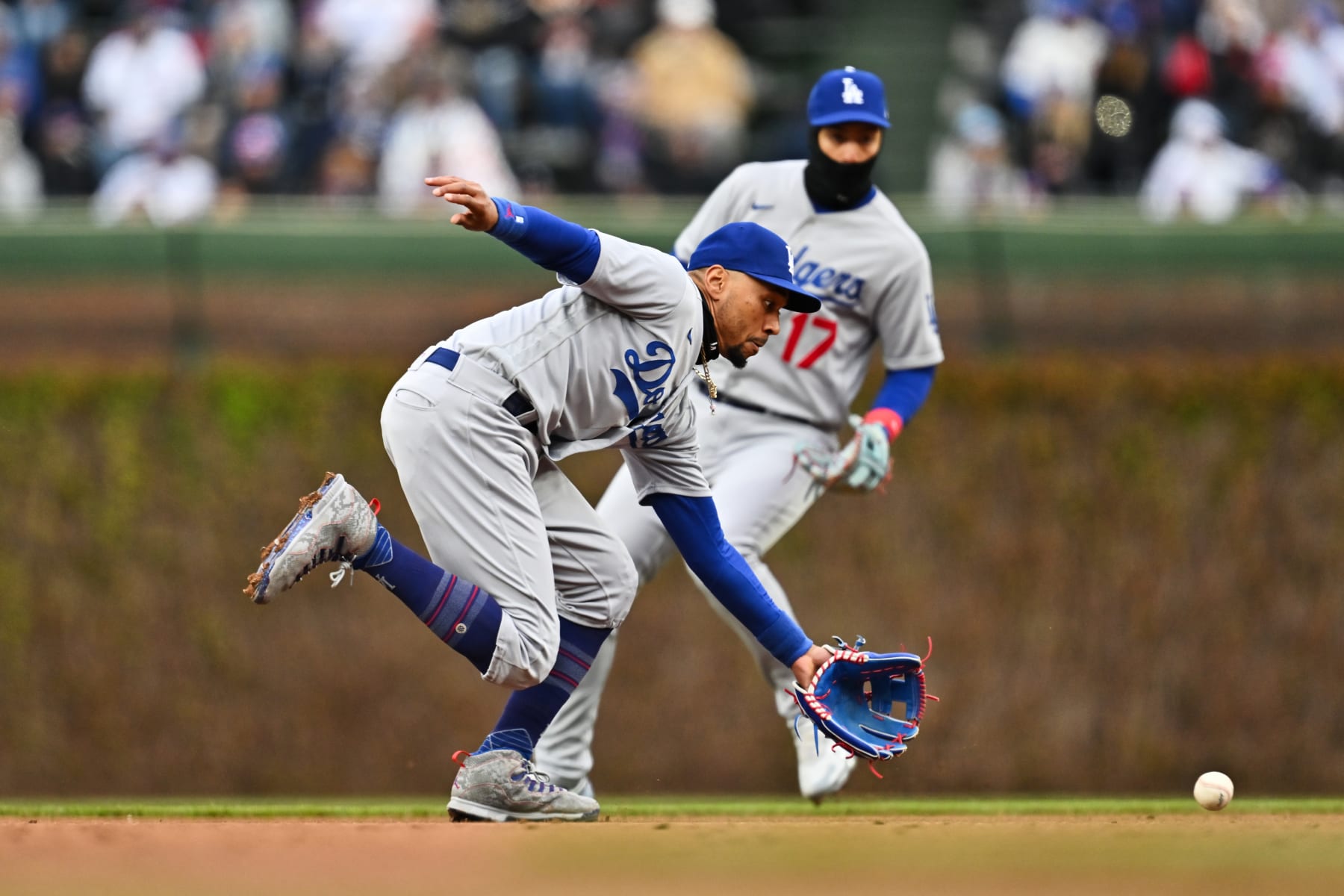 CHICAGO, IL - APRIL 23:  Mookie Betts #50 of the Los Angeles Dodgers fields a ground ball at shortstop against the Chicago Cubs at Wrigley Field on April 23, 2023 in Chicago, Illinois.  (Photo by Jamie Sabau/Getty Images)