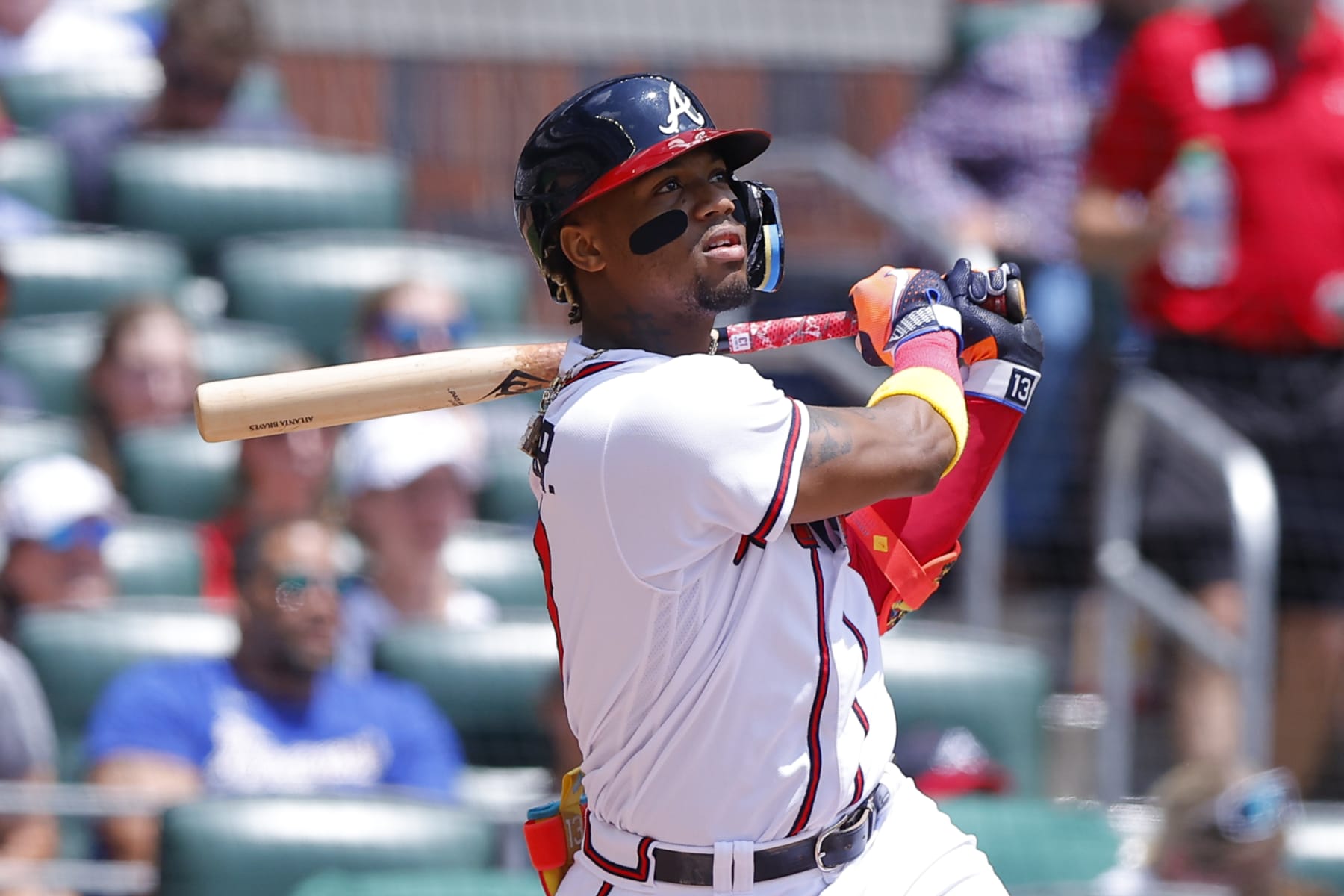 ATLANTA, GA - MAY 07: Ronald Acuna Jr. #13 of the Atlanta Braves reacts as he hits a fly ball during the fifth inning against the Baltimore Orioles at Truist Park on May 7, 2023 in Atlanta, Georgia. (Photo by Todd Kirkland/Getty Images)