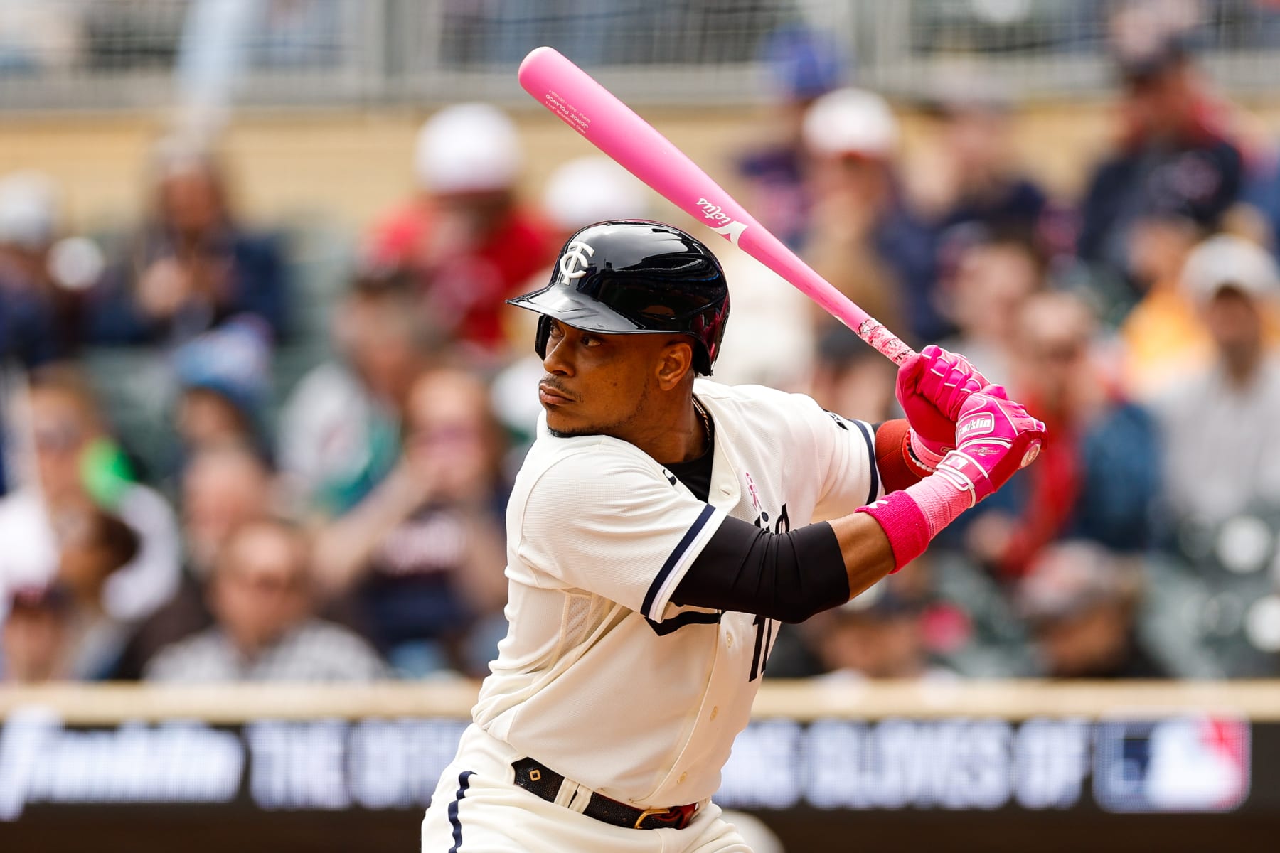 MINNEAPOLIS, MN - MAY 14: Jorge Polanco #11 of the Minnesota Twins takes an at-bat with a pink bat for Mothers Day against the Chicago Cubs in the first inning at Target Field on May 14, 2023 in Minneapolis, Minnesota. The Twins defeated the Cubs 16-3. (Photo by David Berding/Getty Images)