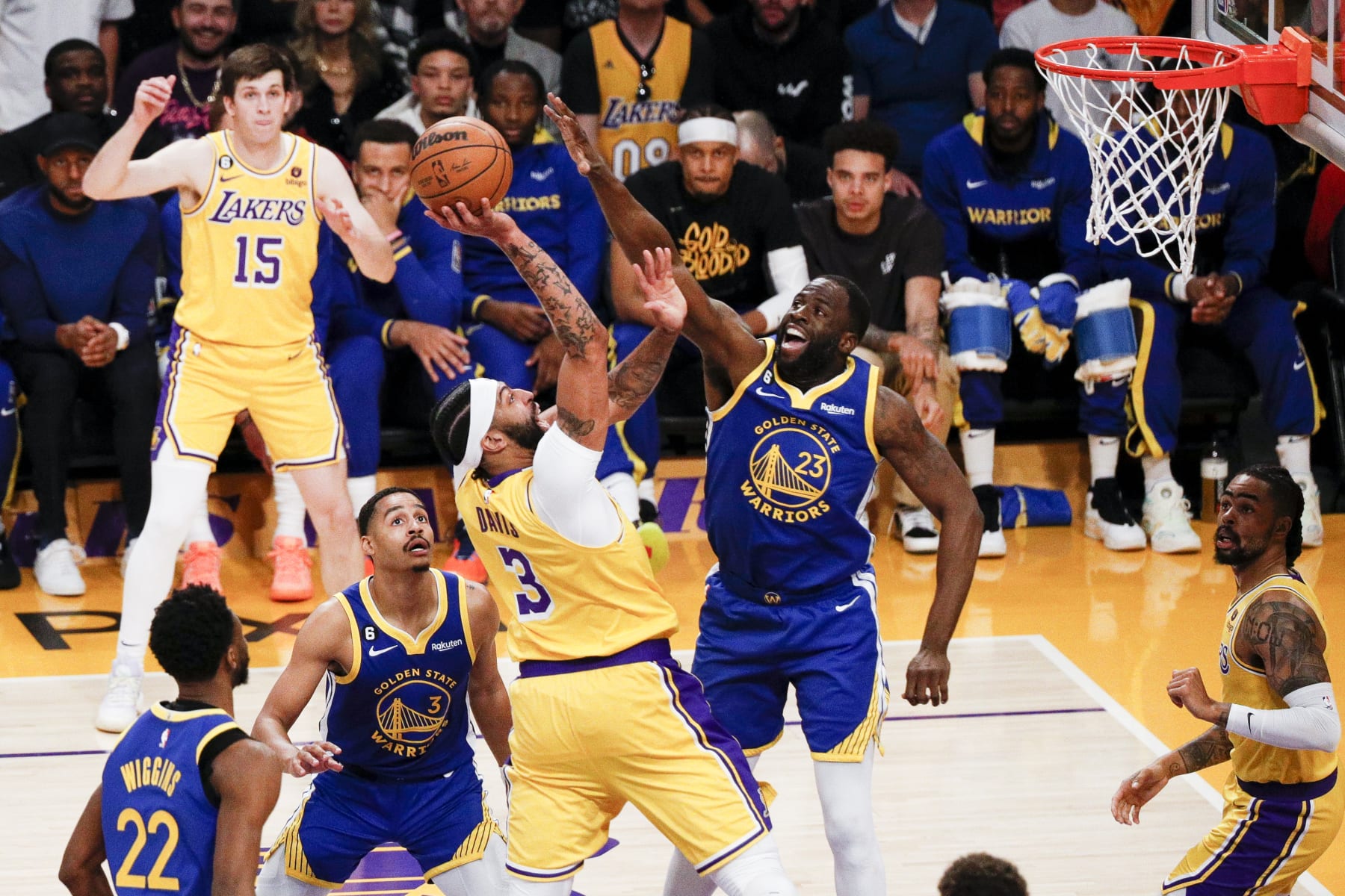 Los Angeles, CA - May 12: Los Angeles Lakers forward Anthony Davis, center, is fouled by Golden State Warriors forward Draymond Green, right, on a shot attempt during the first half of the NBA Playoffs Western Conference semifinals at Crypto.com Arena on Friday, May 12, 2023 in Los Angeles, CA.(Gina Ferazzi / Los Angeles Times via Getty Images)