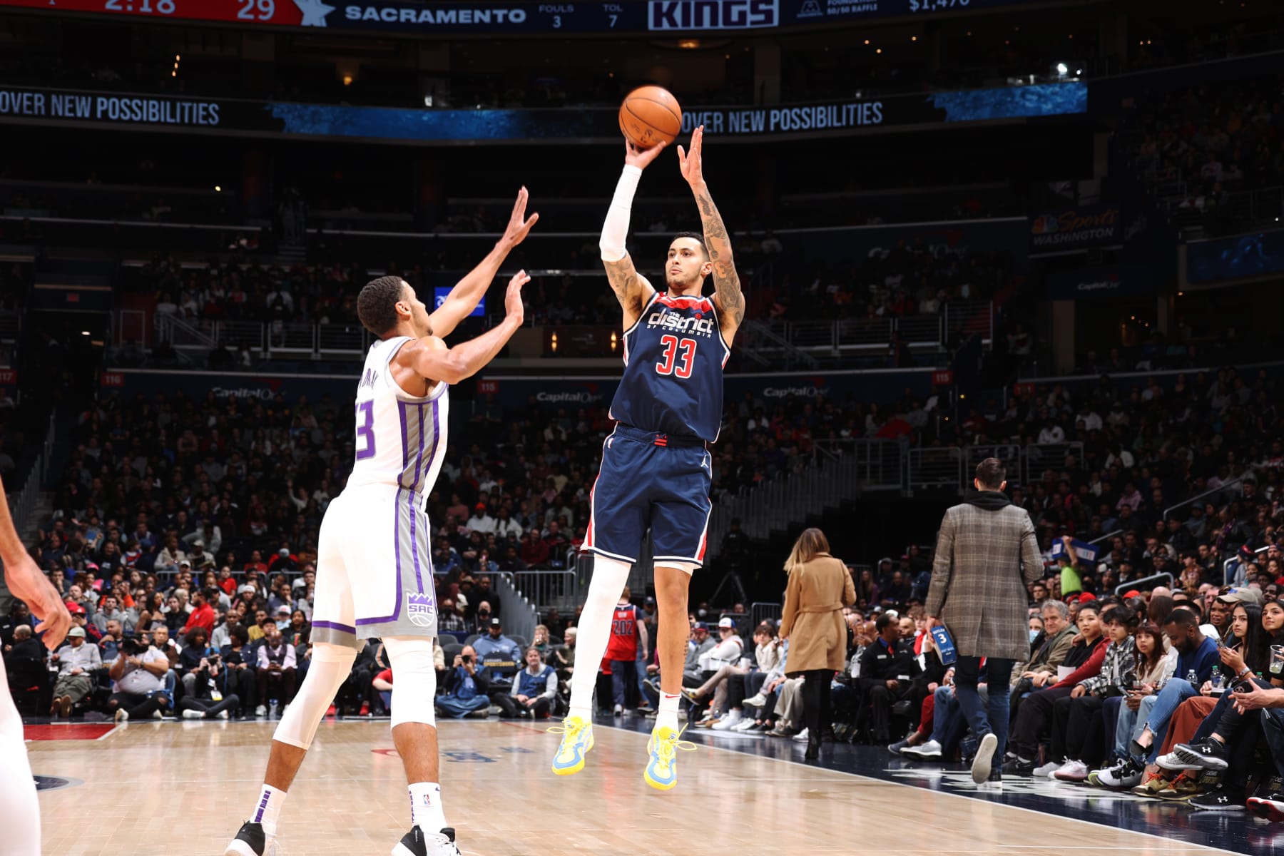 WASHINGTON, DC -  MARCH 18: Kyle Kuzma #33 of the Washington Wizards shoots a three point basket during the game against the Sacramento Kings on March 18, 2023 at Capital One Arena in Washington, DC. NOTE TO USER: User expressly acknowledges and agrees that, by downloading and or using this Photograph, user is consenting to the terms and conditions of the Getty Images License Agreement. Mandatory Copyright Notice: Copyright 2023 NBAE (Photo by Stephen Gosling/NBAE via Getty Images)