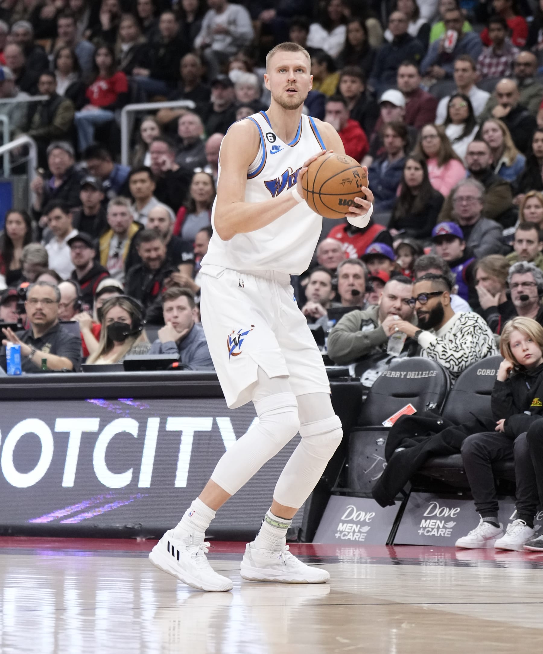 TORONTO, ON - MARCH 26: Kristaps Porzingis #6 of the Washington Wizards shoots against the Toronto Raptors during the second half of their basketball game at the Scotiabank Arena on March 26, 2023 in Toronto, Ontario, Canada. NOTE TO USER: User expressly acknowledges and agrees that, by downloading and/or using this Photograph, user is consenting to the terms and conditions of the Getty Images License Agreement. (Photo by Mark Blinch/Getty Images)