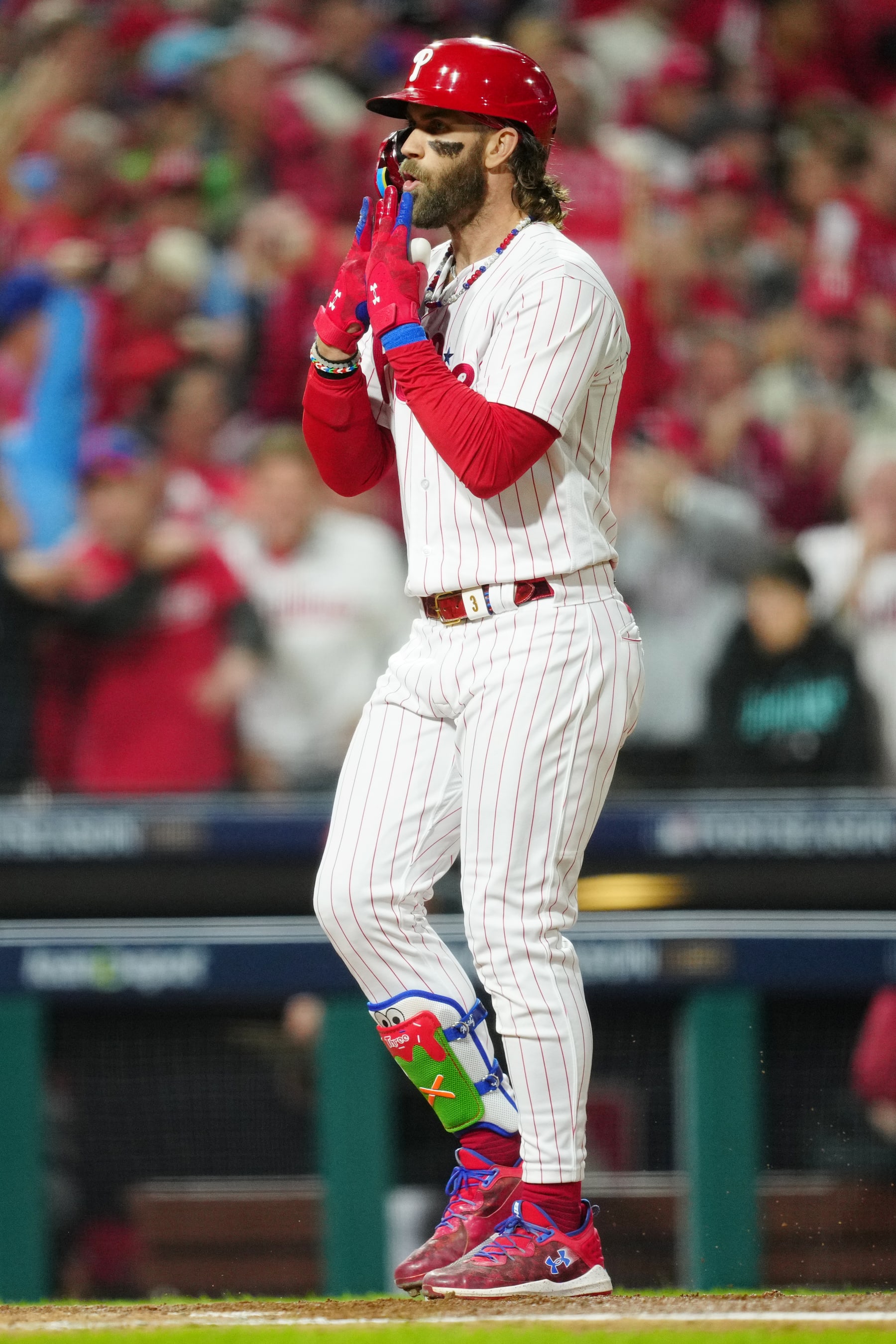 PHILADELPHIA, PA - OCTOBER 16:  Bryce Harper #3 of the Philadelphia Phillies touches home plate after hitting a solo home run in the first inning during Game 1 of the NLCS between the Arizona Diamondbacks and the Philadelphia Phillies at Citizens Bank Park on Monday, October 16, 2023 in Philadelphia, Pennsylvania. (Photo by Mary DeCicco/MLB Photos via Getty Images)