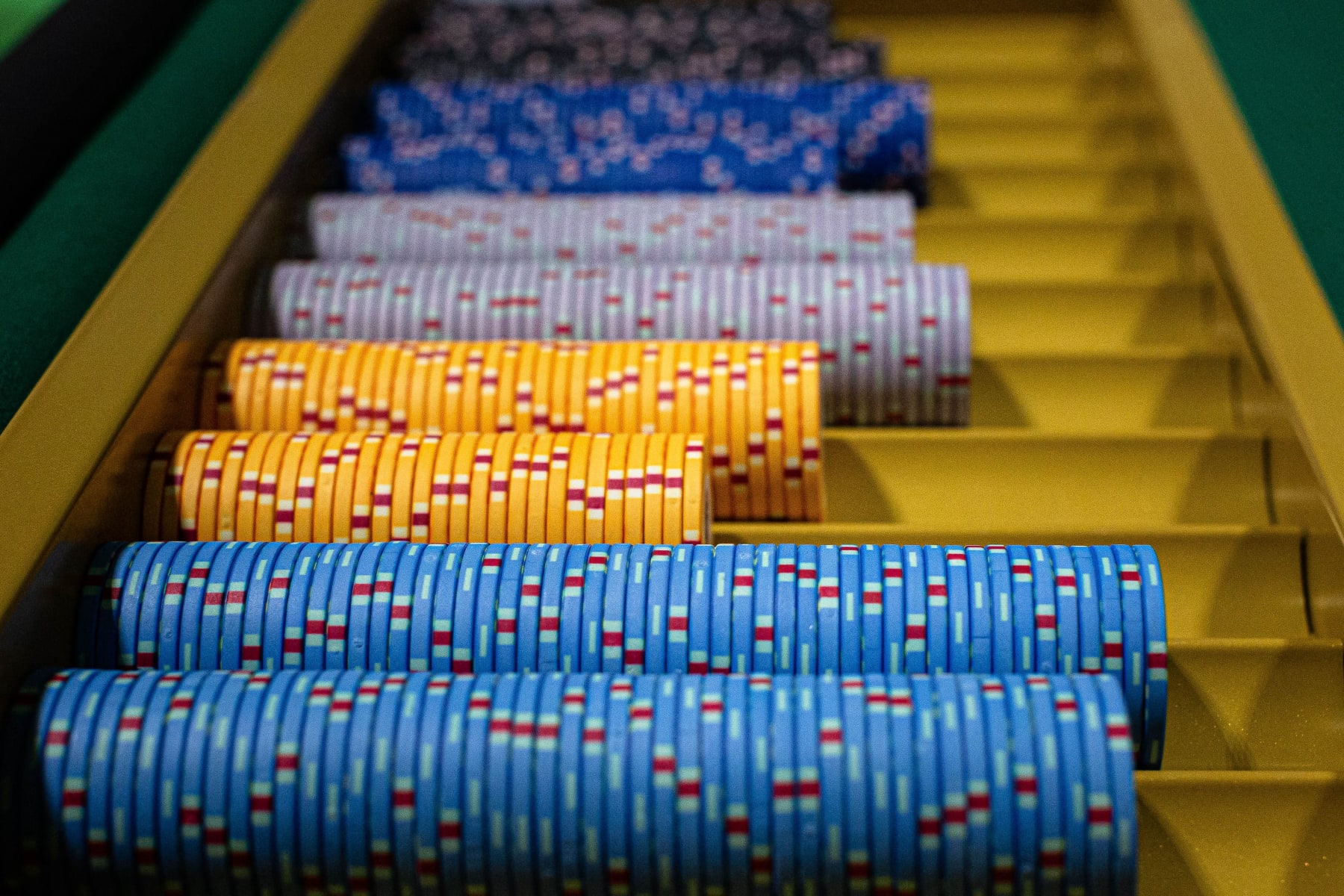 Gambling chips sit in a tray during the Global Gaming Expo Asia (G2E Asia) at a casino in Macau on July 12, 2023. (Photo by Eduardo Leal / AFP) (Photo by EDUARDO LEAL/AFP via Getty Images)