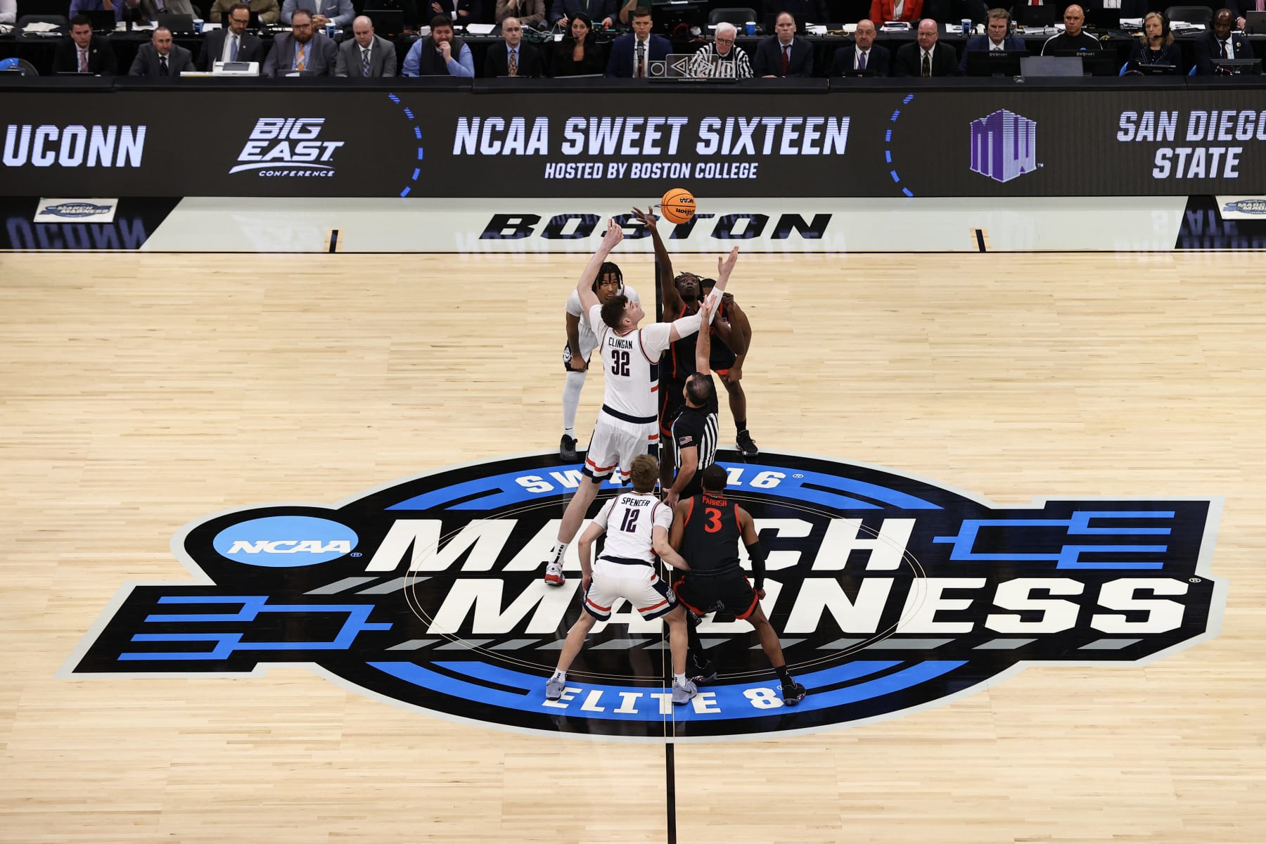 BOSTON, MASSACHUSETTS - MARCH 28:  Donovan Clingan #32 of the Connecticut Huskies and Jay Pal #4 of the San Diego State Aztecs jump for the ball during the Sweet Sixteen round of the 2024 NCAA Men's Basketball Tournament held at TD Garden on March 28, 2024 in Boston, Massachusetts. (Photo by Jamie Schwaberow/NCAA Photos via Getty Images)