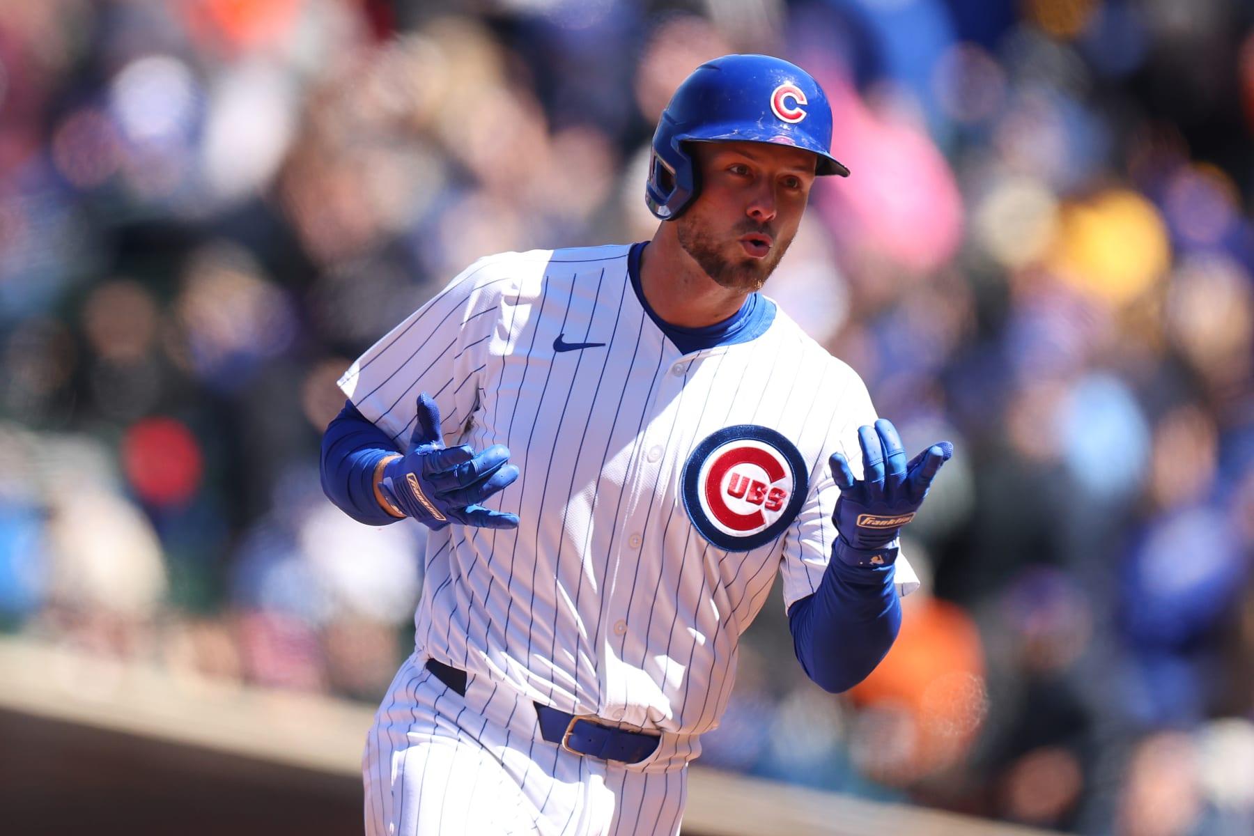 CHICAGO, ILLINOIS - APRIL 05: Michael Busch #29 of the Chicago Cubs celebrates a home run against the Los Angeles Dodgers during the third inning at Wrigley Field on April 05, 2024 in Chicago, Illinois. (Photo by Michael Reaves/Getty Images)