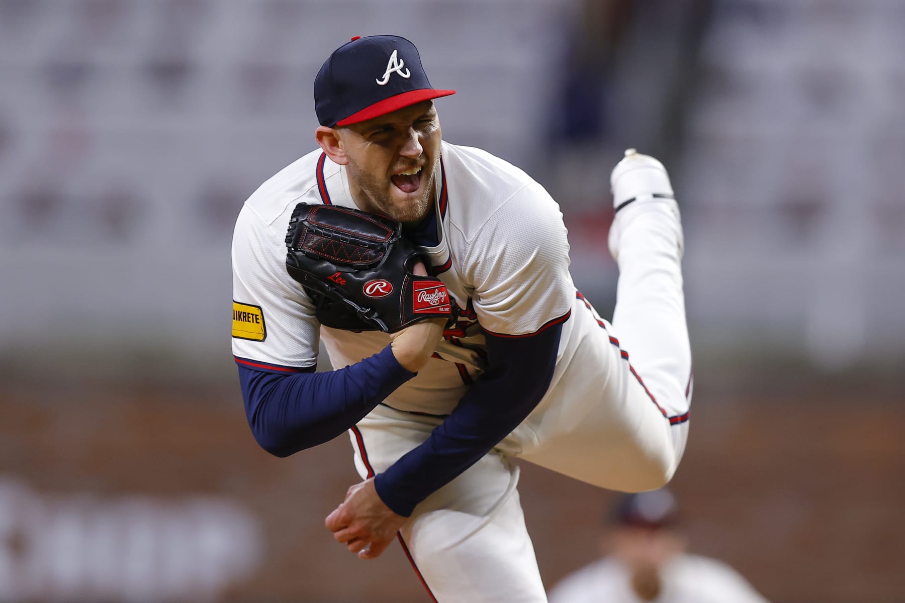 ATLANTA, GEORGIA - APRIL 21: Dylan Lee #52 of the Atlanta Braves pitches during the seventh inning against the Texas Rangers at Truist Park on April 21, 2024 in Atlanta, Georgia. (Photo by Todd Kirkland/Getty Images) ATLANTA, GEORGIA - APRIL 21: Dylan Lee #52 of the Atlanta Braves pitches during the seventh inning against the Texas Rangers at Truist Park on April 21, 2024 in Atlanta, Georgia. (Photo by Todd Kirkland/Getty Images)