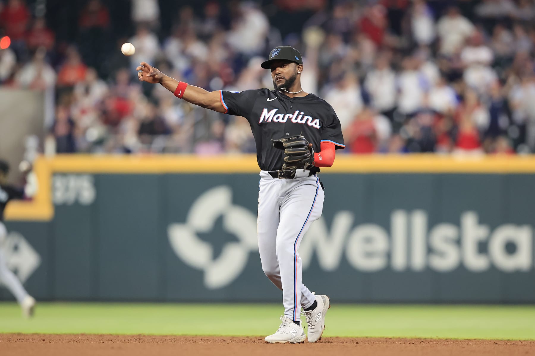 ATLANTA, GA - APRIL 24: Miami Marlins shortstop Vidal Brujan (17) throws a baseball back to the pitcher during the Wednesday evening MLB game between the Miami Marlins and the Atlanta Braves on April 24, 2024 at Truist Park in Atlanta, Georgia.   (Photo by David J. Griffin/Icon Sportswire via Getty Images)
