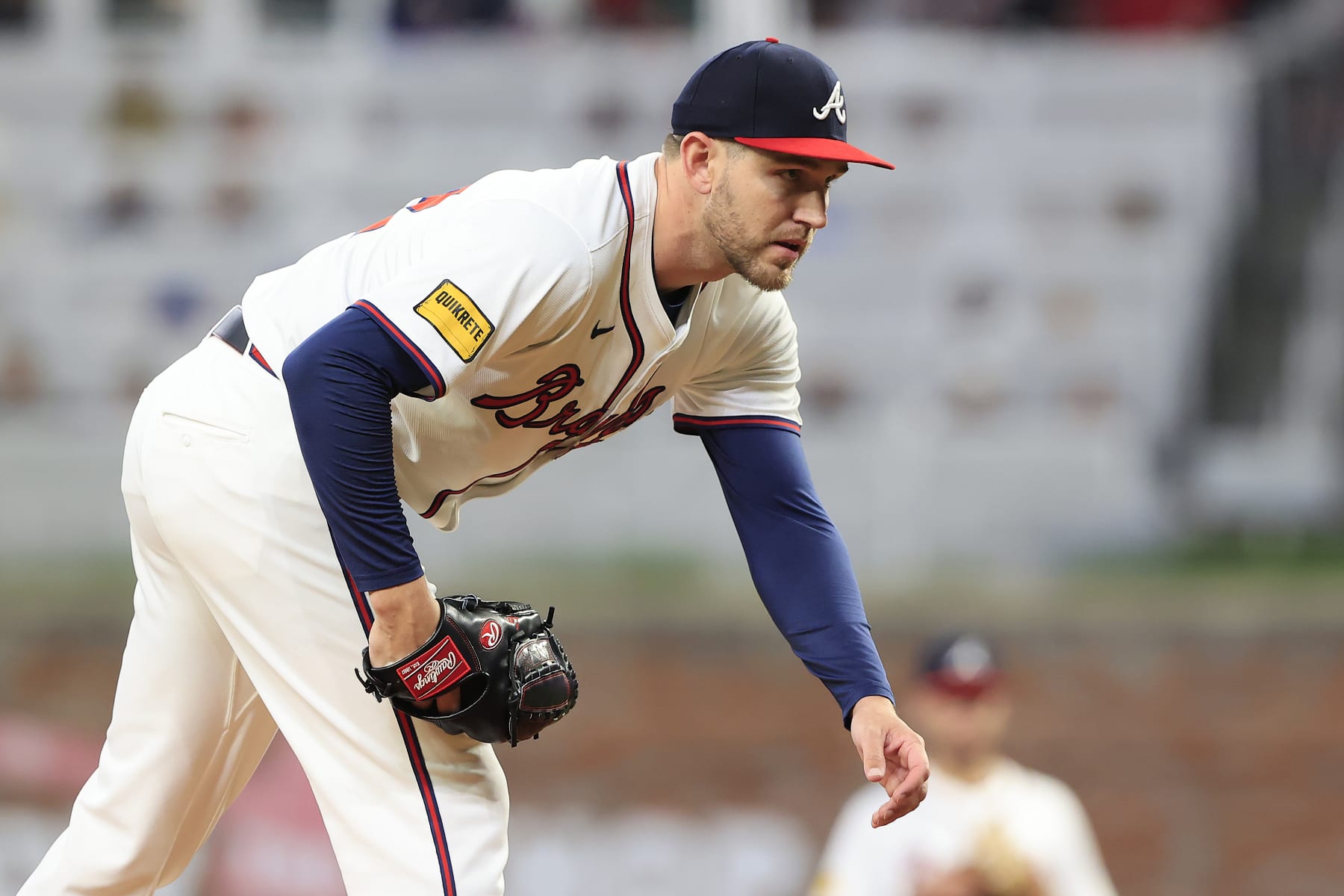 ATLANTA, GA - MAY 13: Atlanta Braves pitcher Dylan Lee (52) stares down a batter during the Monday evening MLB game between the Chicago Cubs and the Atlanta Braves on May 13, 2024 at Truist Park in Atlanta, Georgia.  (Photo by David J. Griffin/Icon Sportswire via Getty Images)