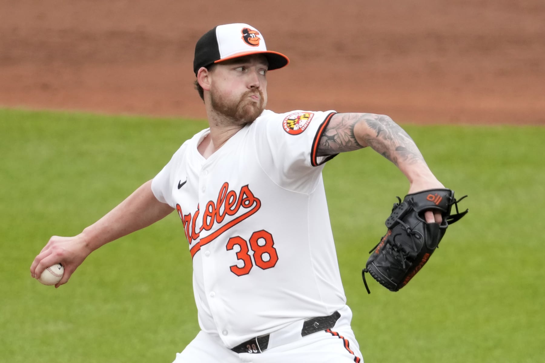 BALTIMORE, MARYLAND - MAY 15:  Kyle Bradish #38 of the Baltimore Orioles] pitches in the third inning during a baseball game against the Toronto Blue Jays at Oriole Park at Camden Yards on May 15, 2024 in Baltimore, Maryland.  (Photo by Mitchell Layton/Getty Images)
