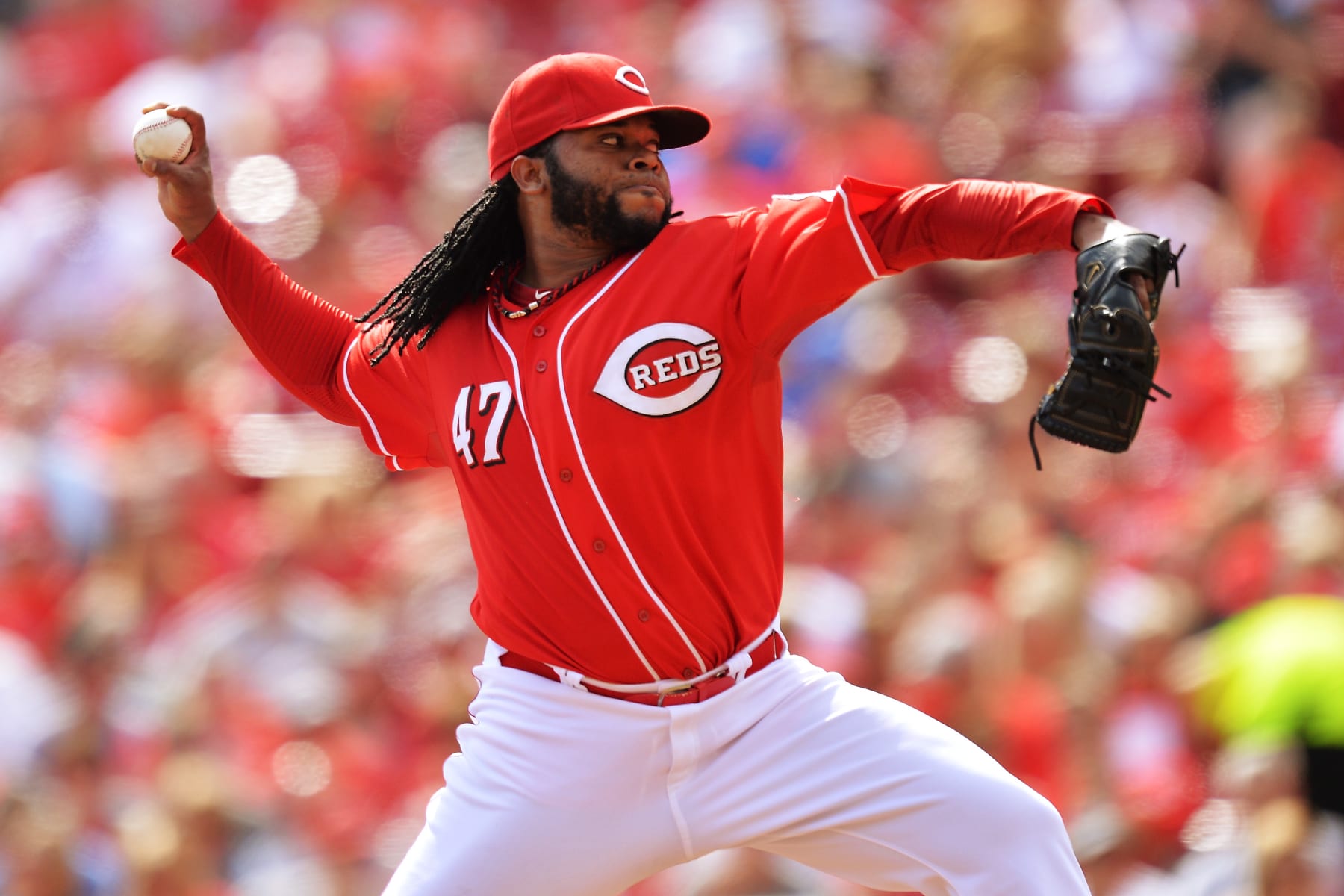 CINCINNATI, OH - SEPTEMBER 28: Johnny Cueto #47 of the Cincinnati Reds pitches in the third inning against the Pittsburgh Pirates at Great American Ball Park on September 28, 2014 in Cincinnati, Ohio. Cueto earned his 20th win after Cincinnati defeated Pittsburgh 4-1. (Photo by Jamie Sabau/Getty Images)