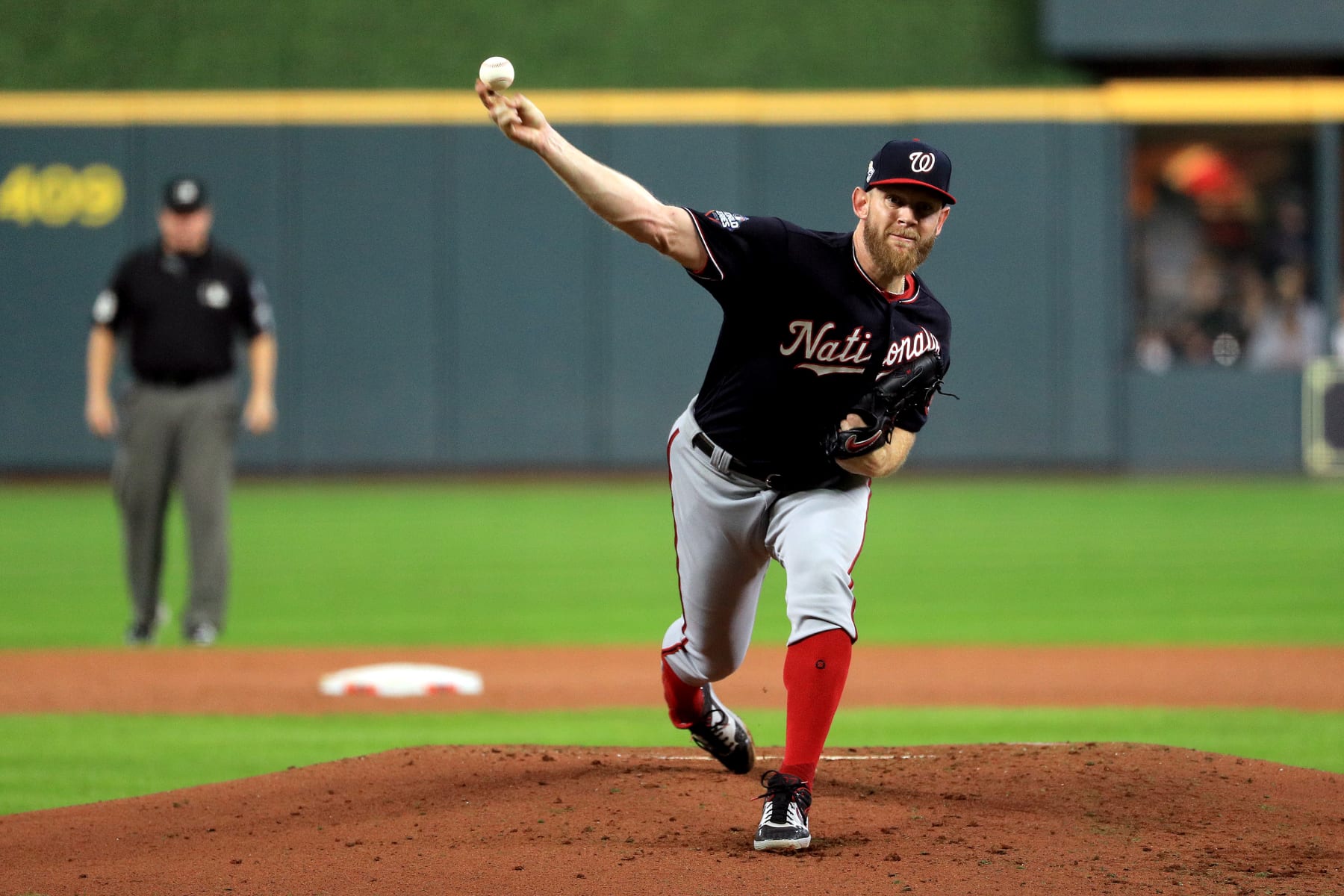 HOUSTON, TEXAS - OCTOBER 29:  Stephen Strasburg #37 of the Washington Nationals delivers the pitch against the Houston Astros during the first inning in Game Six of the 2019 World Series at Minute Maid Park on October 29, 2019 in Houston, Texas. (Photo by Mike Ehrmann/Getty Images)