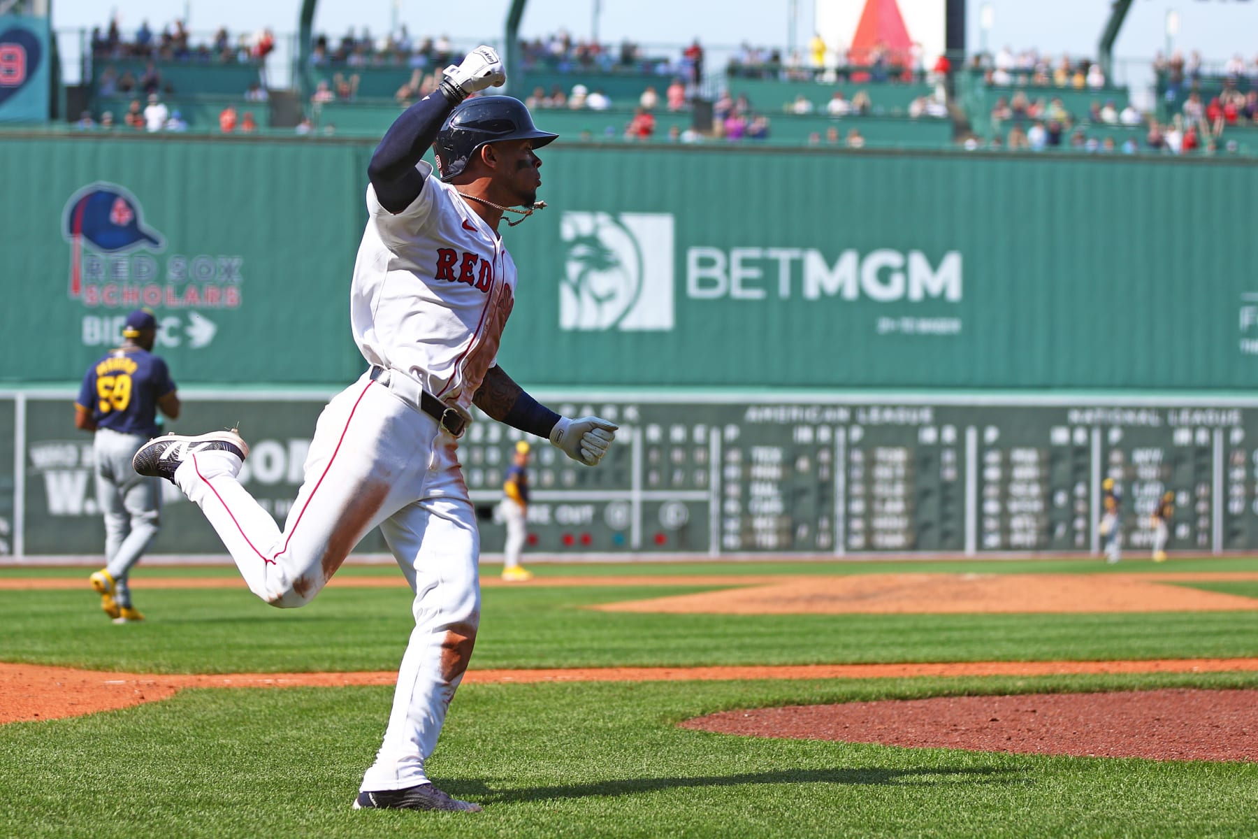 BOSTON, MASSACHUSETTS - MAY 26: Ceddanne Rafaela #43 of the Boston Red Sox  celebrates after scoring the game winning run Milwaukee Brewers during the eighth inning at Fenway Park on May 26, 2024 in Boston, Massachusetts. The Red Sox defeat the Brewers 2-1. (Photo by Maddie Meyer/Getty Images)
