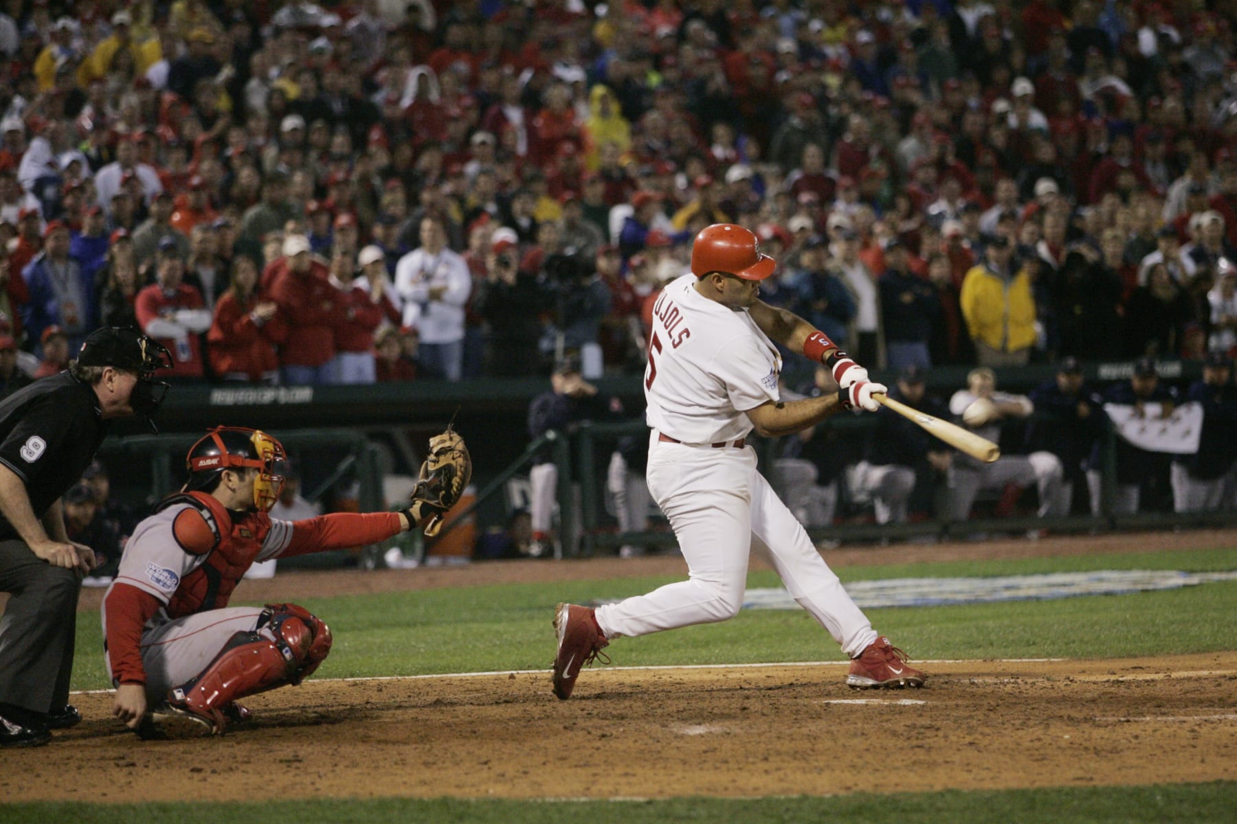 ST LOUIS - OCTOBER 26:  Albert Pujols of the St. Louis Cardinals bats during game three of the 2004 World Series against the Boston Red Sox at Busch Stadium on October 26, 2004 in St. Louis, MO.  The Red Sox defeated the Cardinals 4-1. (Photo by Rich Pilling/ MLB via Getty Images).                                     
