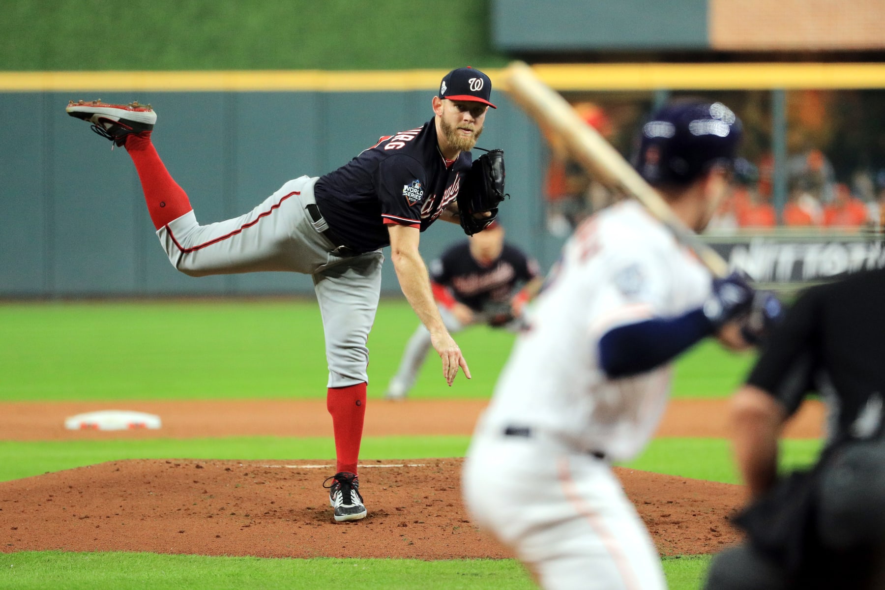 HOUSTON, TEXAS - OCTOBER 29:  Stephen Strasburg #37 of the Washington Nationals delivers the pitch against the Houston Astros during the first inning in Game Six of the 2019 World Series at Minute Maid Park on October 29, 2019 in Houston, Texas. (Photo by Mike Ehrmann/Getty Images)