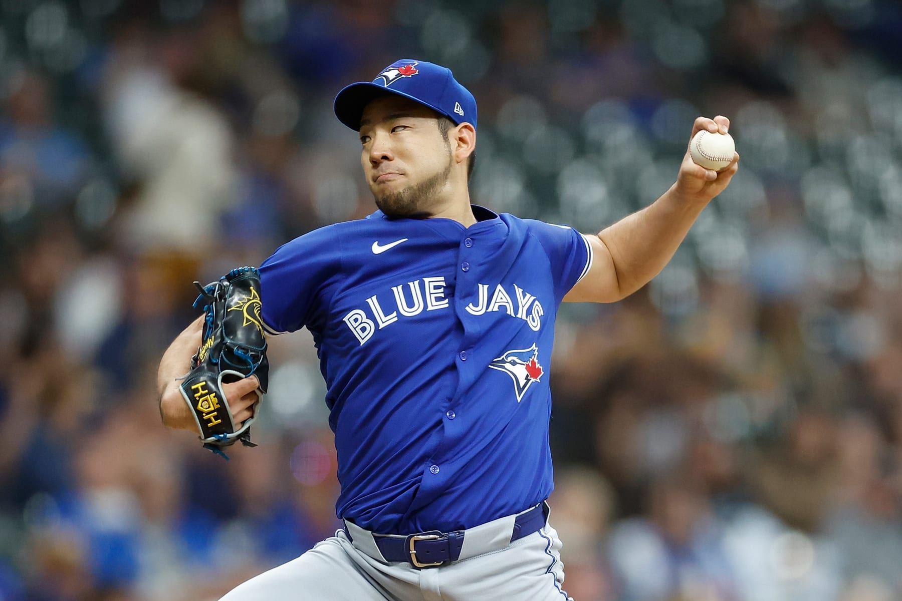 MILWAUKEE, WISCONSIN - JUNE 11: Yusei Kikuchi #16 of the Toronto Blue Jays throws a pitch against the Milwaukee Brewers at American Family Field on June 11, 2024 in Milwaukee, Wisconsin. (Photo by John Fisher/Getty Images)
