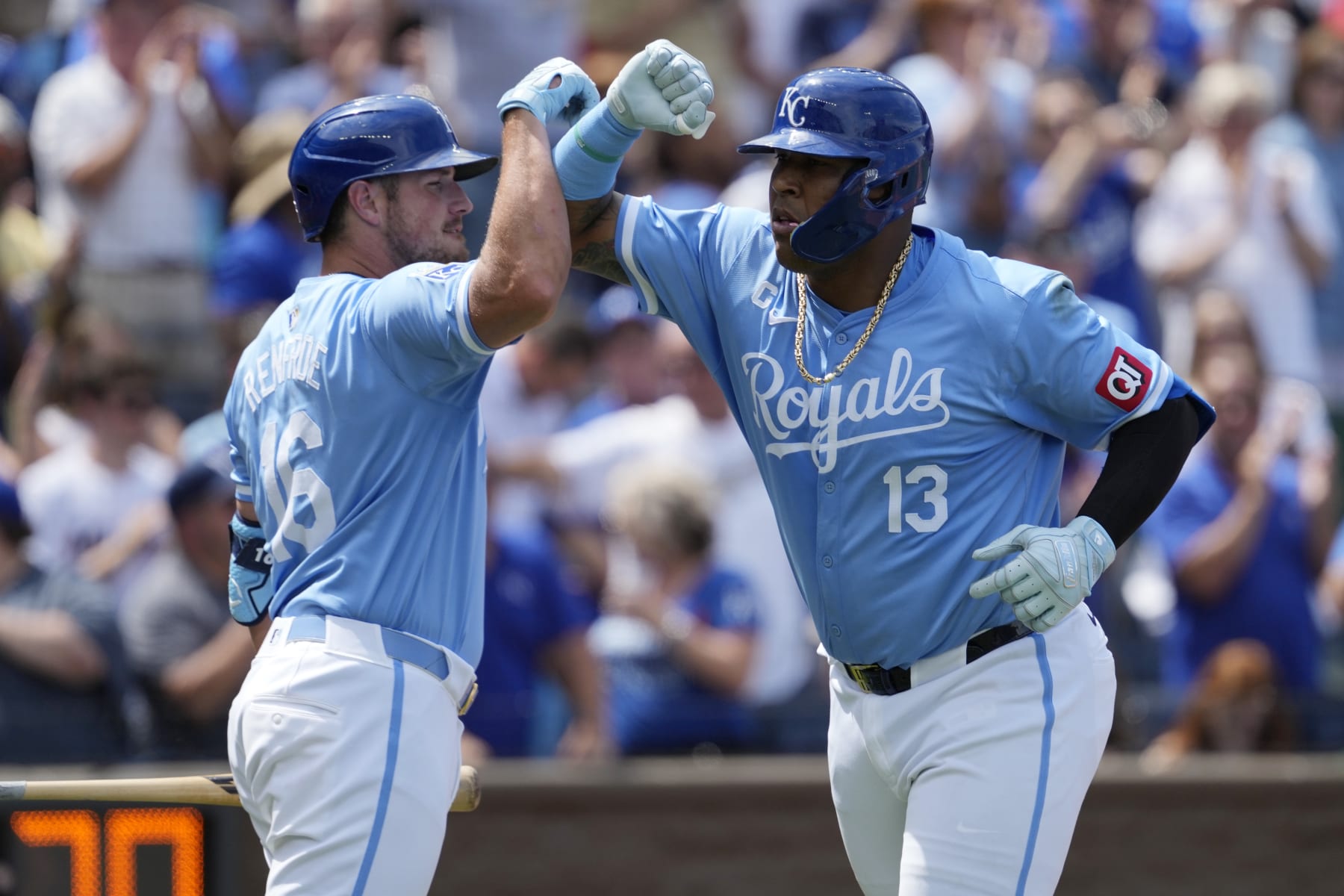 KANSAS CITY, MISSOURI - JUNE 30: Salvador Perez #13 of the Kansas City Royals celebrates his two-run home run with Hunter Renfroe #16 of the Kansas City Royals in the seventh inning against the Cleveland Guardians at Kauffman Stadium on June 30, 2024 in Kansas City, Missouri. (Photo by Ed Zurga/Getty Images)