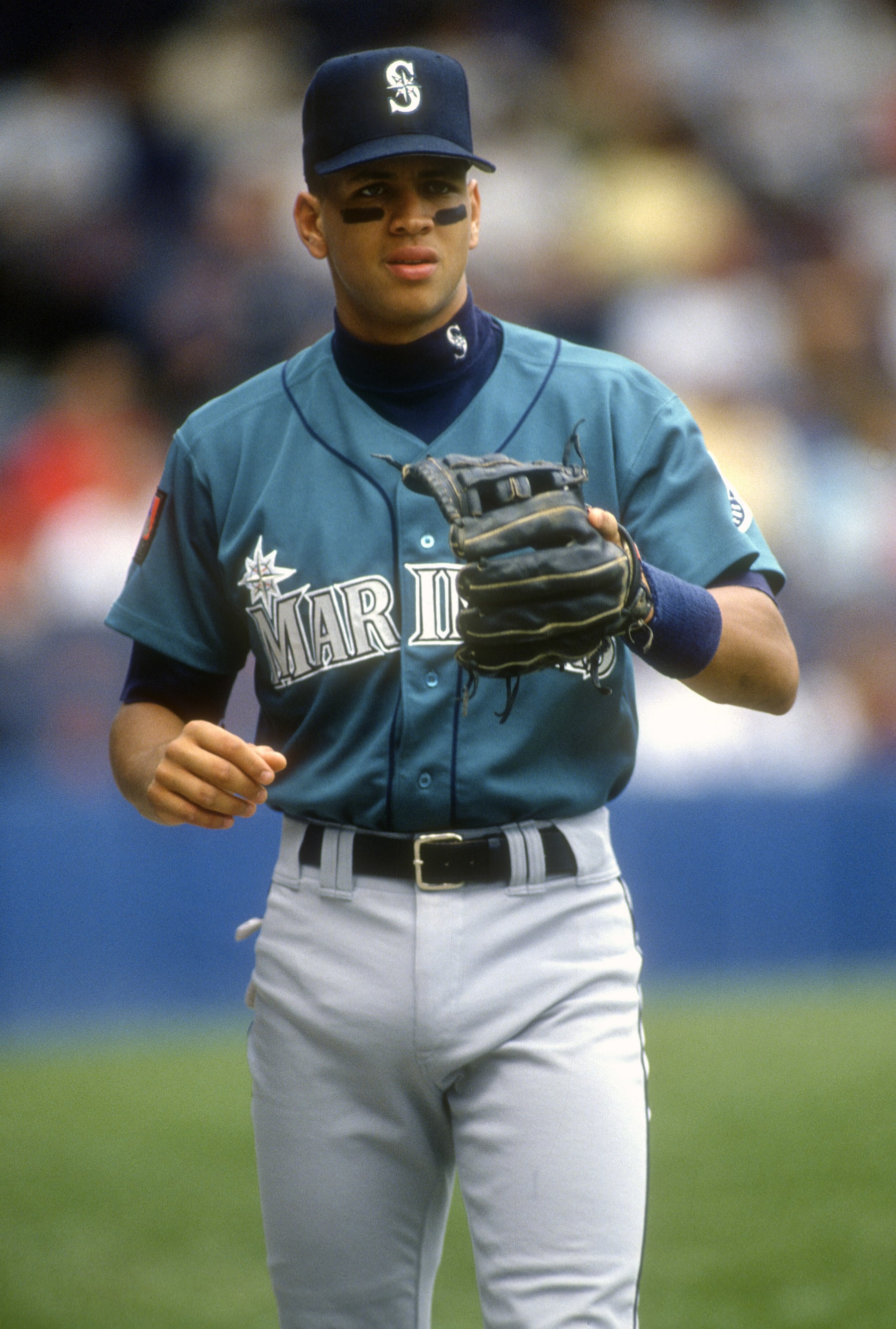 NEW YORK - CIRCA 2094: Alex Rodriguez #3 of the Seattle Mariners warms up playing catch prior to the start of an Major League Baseball game against the New York Yankees circa 1994 at Yankee Stadium in the Bronx borough of New York City. Rodriguez played for the Mariners from 1994-2000. (Photo by Focus on Sport/Getty Images)
