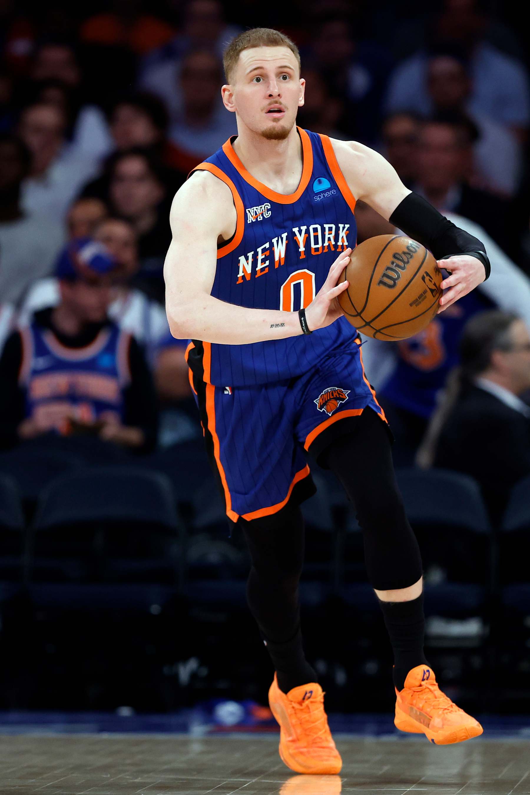 NEW YORK, NEW YORK - MAY 14: Donte DiVincenzo #0 of the New York Knicks passes the ball during Game Five of the Eastern Conference Second Round Playoffs against the Indiana Pacers at Madison Square Garden on May 14, 2024 in New York City. The Knicks won 121-91. NOTE TO USER: User expressly acknowledges and agrees that, by downloading and or using this photograph, User is consenting to the terms and conditions of the Getty Images License Agreement. (Photo by Sarah Stier/Getty Images)