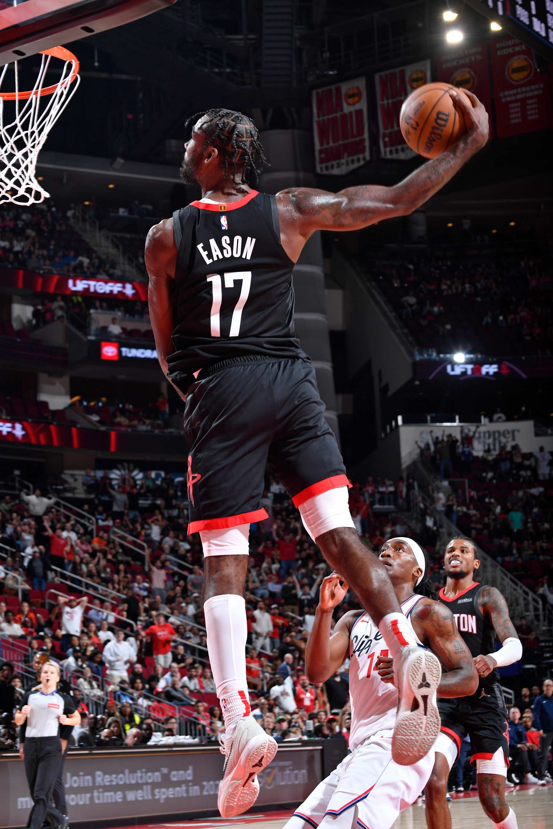 HOUSTON, TX - NOVEMBER 13: Tari Eason #17 of the Houston Rockets drives to the basket during the game against the LA Clippers  on November 13, 2024 at the Toyota Center in Houston, Texas. NOTE TO USER: User expressly acknowledges and agrees that, by downloading and or using this photograph, User is consenting to the terms and conditions of the Getty Images License Agreement. Mandatory Copyright Notice: Copyright 2024 NBAE (Photo by Logan Riely/NBAE via Getty Images)