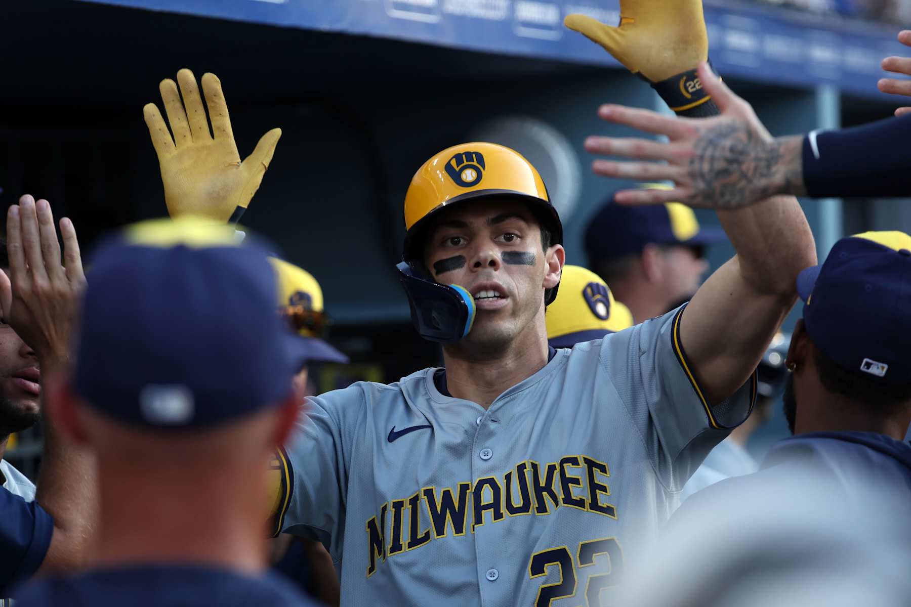 LOS ANGELES, CA - JULY 6:  Christian Yelich #22 of the Milwaukee Brewers celebrates during the game against the Los Angeles Dodgers at Dodger Stadium on July 6, 2024 in Los Angeles, California. The Dodgers defeated the Brewers 5-3. (Photo by Rob Leiter/MLB Photos via Getty Images)