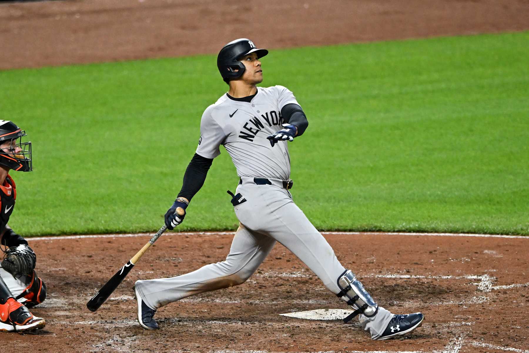 BALTIMORE, MARYLAND - APRIL 30, 2024: Juan Soto #22 of the New York Yankees hits a solo home run during the sixth inning against the Baltimore Orioles at Oriole Park at Camden Yards on April 30, 2024 in Baltimore, Maryland. (Photo by Chris Bernacchi/Diamond Images via Getty Images)