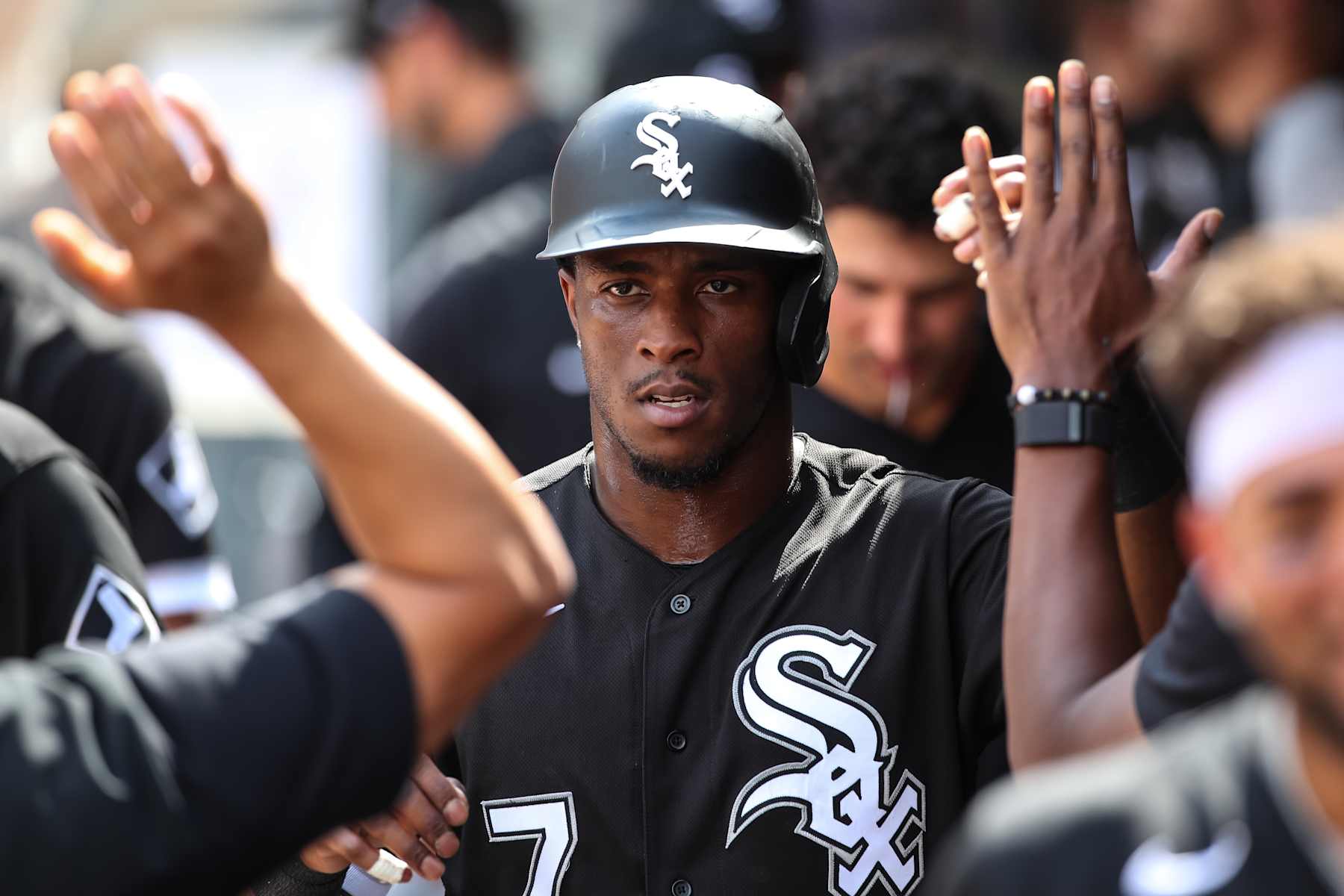 MINNEAPOLIS, MN - JULY 16: Tim Anderson #7 of the Chicago White Sox celebrates scoring a run against the Minnesota Twins with teammates in the sixth inning of the game at Target Field on July 16, 2022 in Minneapolis, Minnesota. The Twins defeated the White Sox 6-3. (Photo by David Berding/Getty Images)