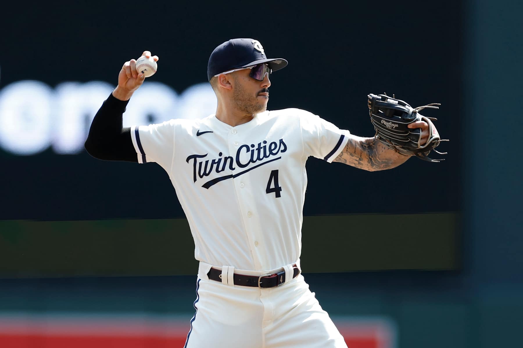 MINNEAPOLIS, MN - AUGUST 30: Carlos Correa #4 of the Minnesota Twins looks to throw the ball during the game between the Cleveland Guardians and the Minnesota Twins at Target Field on Wednesday, August 30, 2023 in Minneapolis, Minnesota. (Photo by David Berding/MLB Photos via Getty Images)