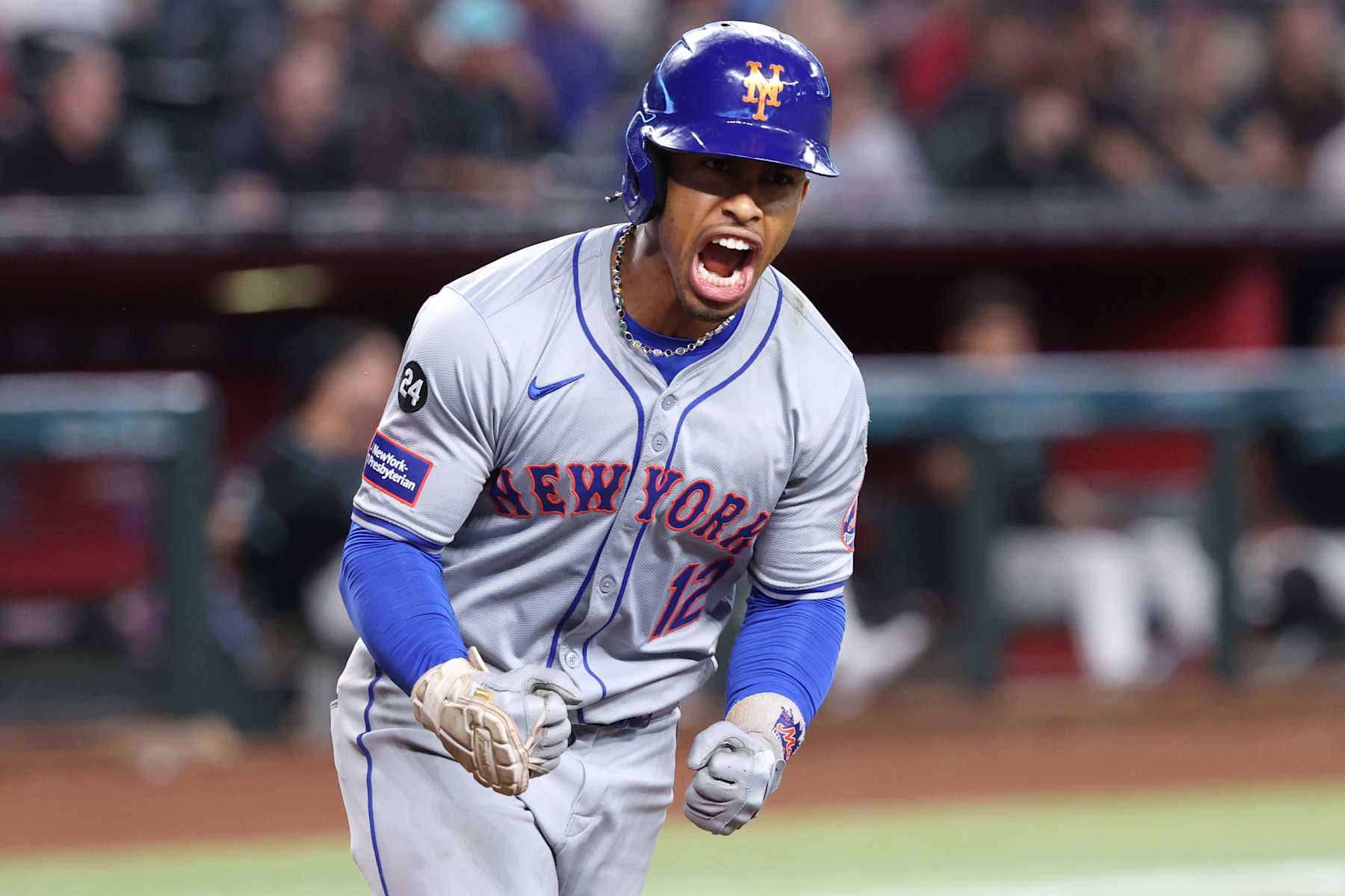 PHOENIX, ARIZONA - AUGUST 29: Francisco Lindor #12 of the New York Mets reacts after hitting a solo home run during the sixth inning against the Arizona Diamondbacks at Chase Field on August 29, 2024 in Phoenix, Arizona. The Mets defeated the Diamondbacks 3-2. (Photo by Chris Coduto/Getty Images)