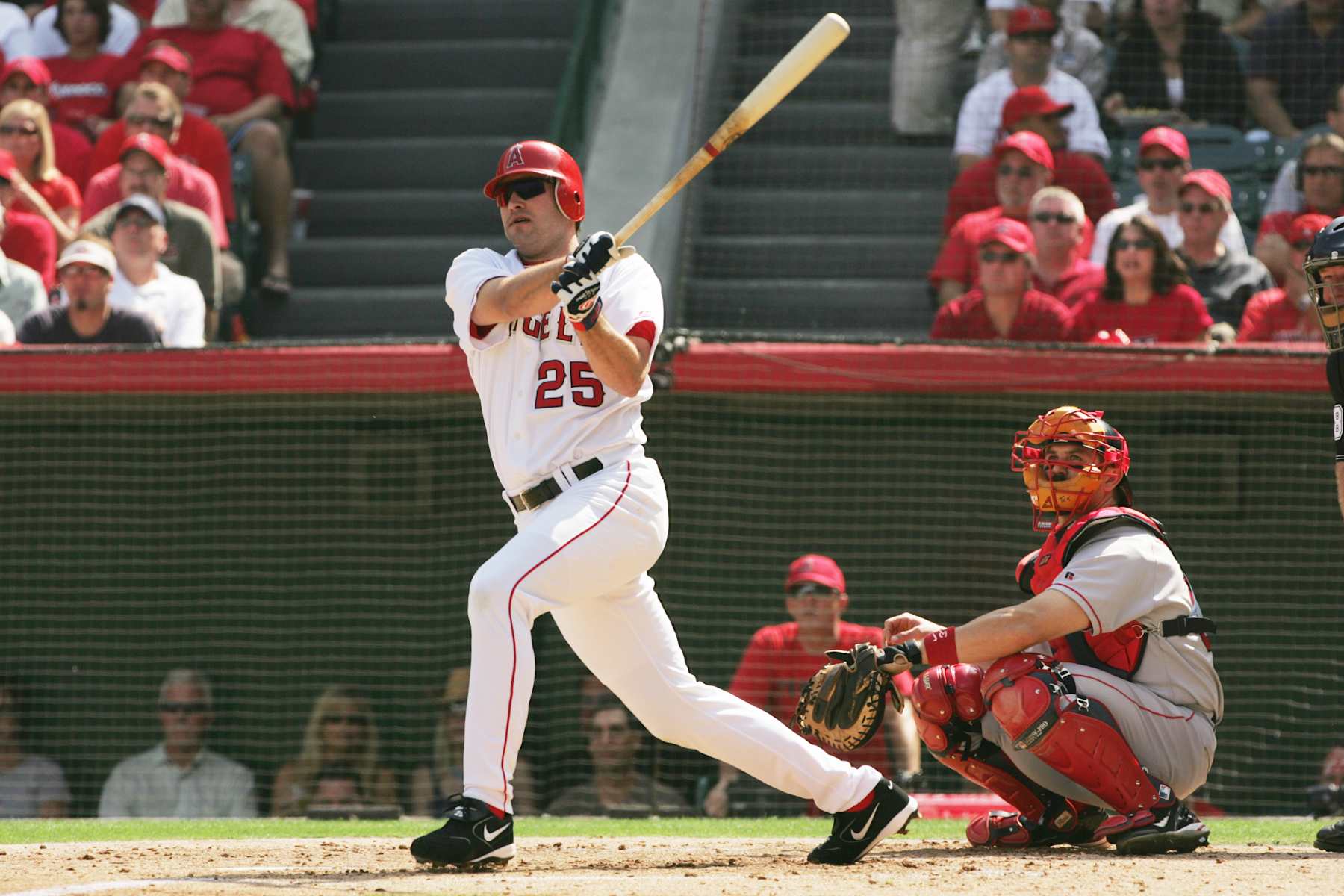 ANAHEIM, CA - OCTOBER 5:  Third baseman Troy Glaus #25 of the Anaheim Angels takes a swing during the American League Division Series with the Boston Red Sox, Game One on October 5, 2004 at Angel Stadium of Anaheim in Anaheim, California. Boston won 9-3. (Photo by Stephen Dunn/Getty Images)