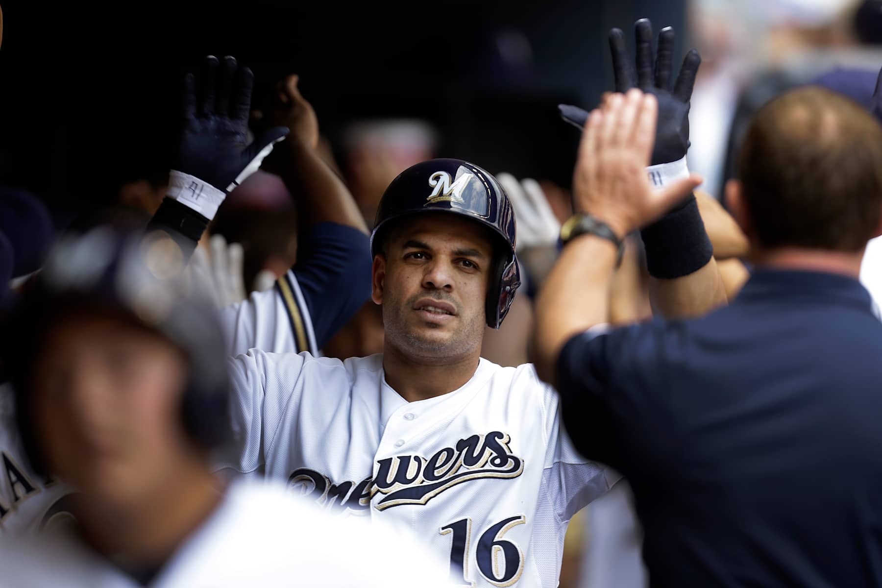 MILWAUKEE, WI - AUGUST 21: Aramis Ramirez #16 of the Milwaukee Brewers celebrates in the dugout after hitting a three run homer in the bottom of the third inning against the St. Louis Cardinals at Miller Park on August 21, 2013 in Milwaukee, Wisconsin. (Photo by Mike McGinnis/Getty Images)